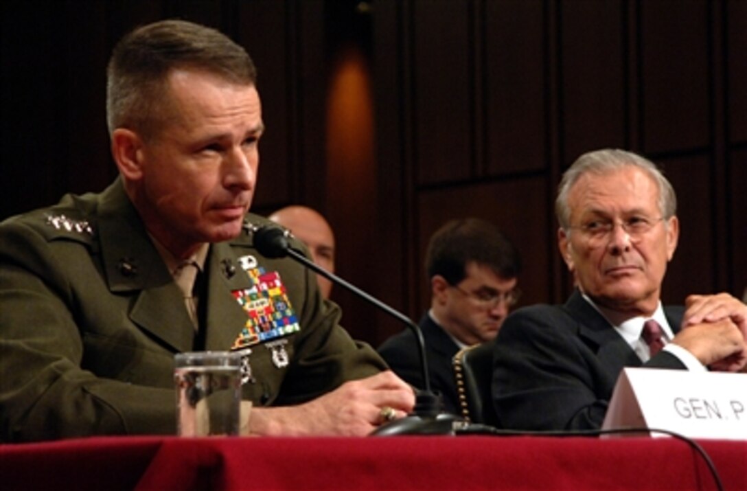 Chairman of the Joint Chiefs of Staff U.S. Marine Corps Gen. Peter Pace testifies to the Senate Armed Services Committee on Iraq, Afghanistan and the war on terror during a hearing on Capitol Hill in Washington, D.C., Aug. 3, 2006. Pace was joined by Secretary of Defense Donald H. Rumsfeld and U.S. Army Gen. John Abizaid, commander of the United States Central Command. 