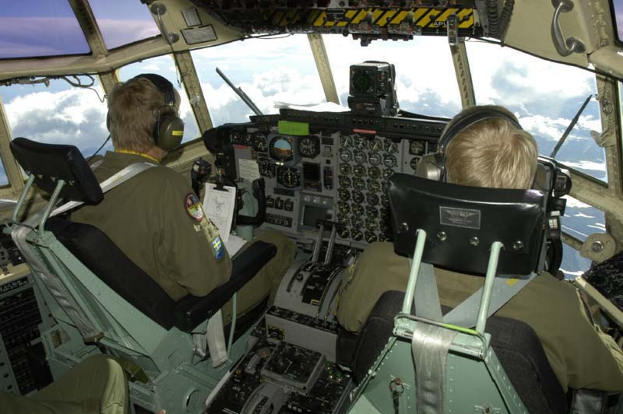 A Swedish aircrew flies a C-130 Hercules to Eielson Air Force Base, Alaska, July 14, to participate Cooperative Cope Thunder, a multi-national exercise that continues through Aug. 5.  (Courtesy photo/Swedish 1st Lt. Peter Liander)