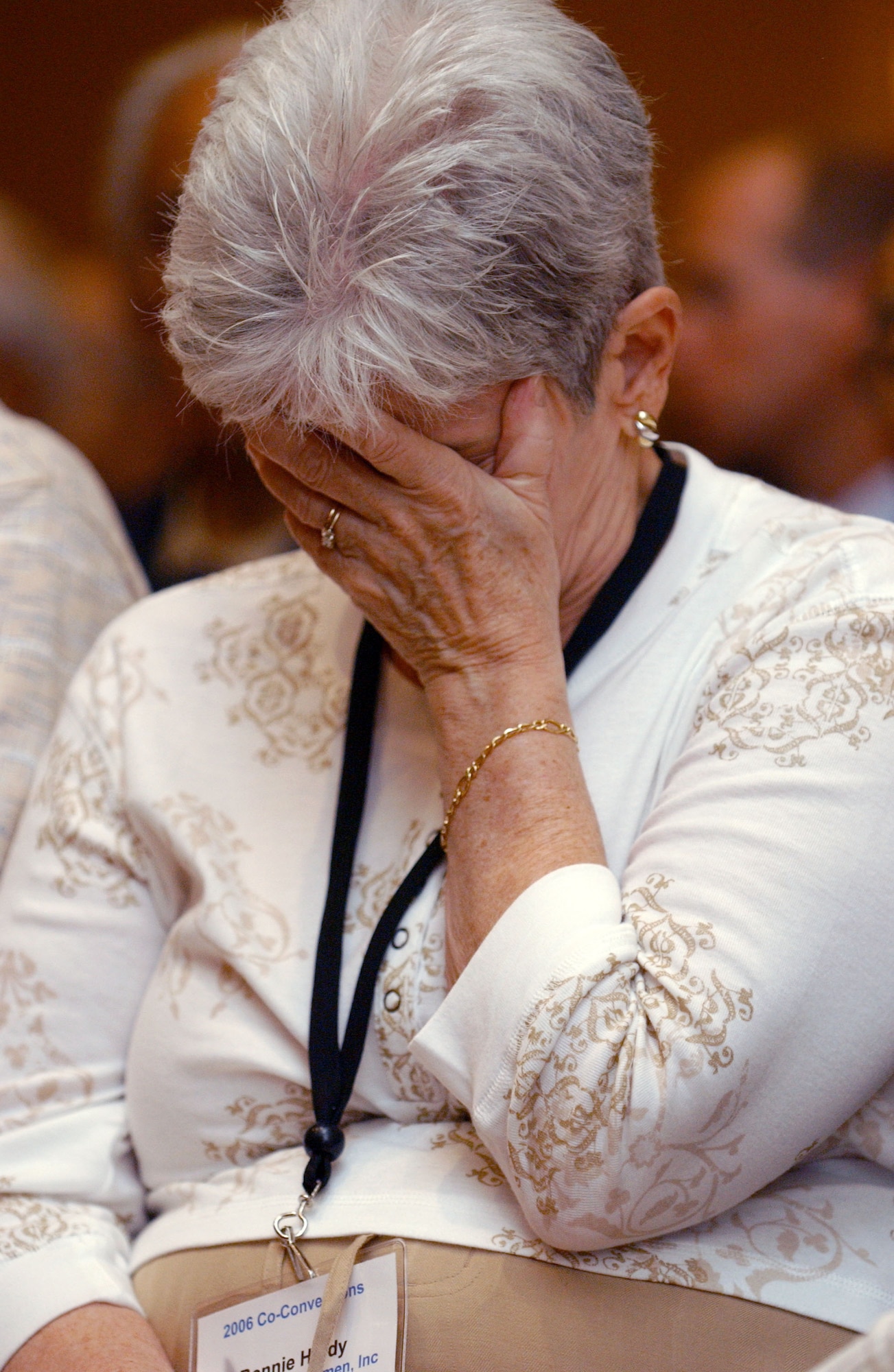 Bonnie Hardy grieves during the "Lonely Eagles Ceremony" on Aug. 2 marking the passing of Tuskegee Airman from August 2005 through July 2006. The ceremony was at the Tuskegee Airmen, Inc., 35th Annual National Convention in Phoenix. The organization exposes minority youth to aviation and aerospace technology. (U.S. Air Force photo/Senior Airman Francisco V. Govea II)
