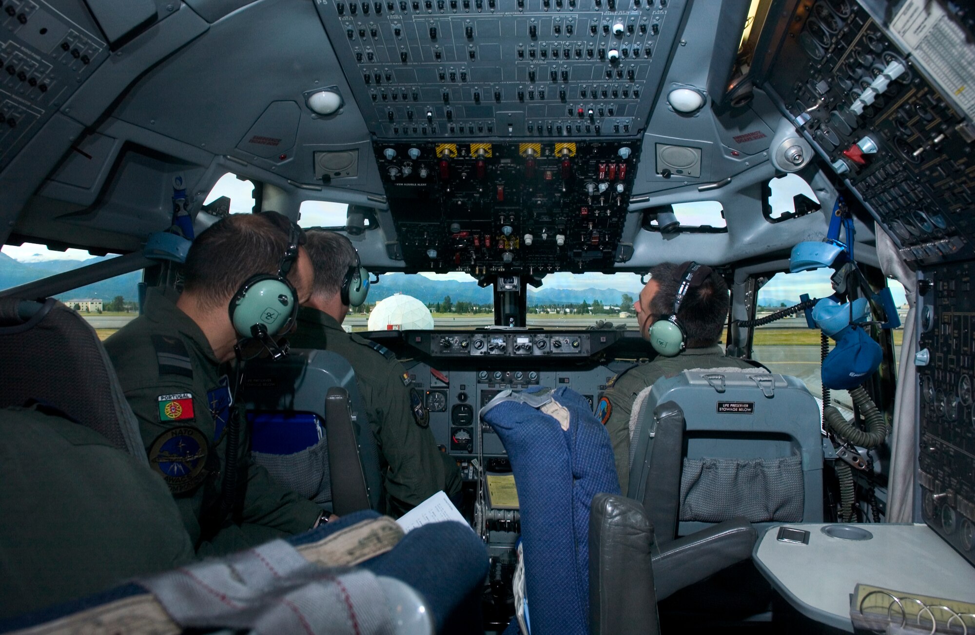 ELMENDORF AIR FORCE BASE, Alaska -- NATO Members conducts pre-flight checks on an E-3 Airborne Warning And Control System aircraft. NATO is in Alaska participating in Cooperative Cope Thunder along with other multinational air crews. (U.S. Air Force Photo by Senior Airman Garrett Hothan)(RELEASED)

