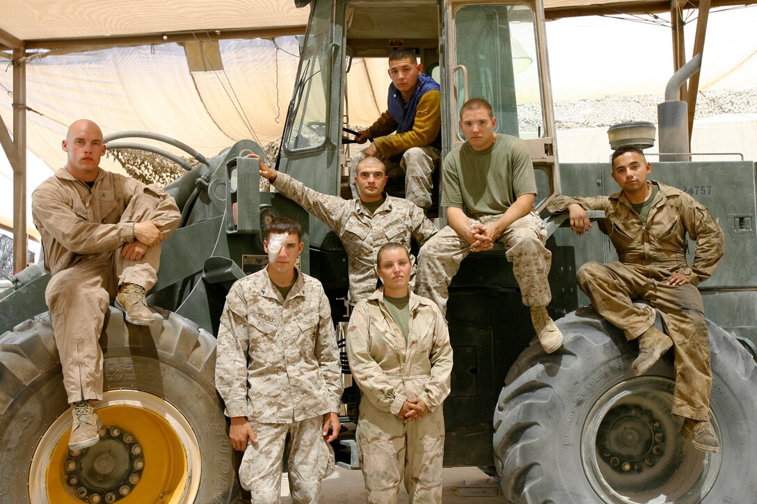 Seven Marines with Combat Logistics Regiment 15, 1st Marine Logistics Group, successfully up-armored forklifts by creating an armored helmet that helps protect the heavy equipment operators from small-arms fire and other forms of insurgent attack. At a ceremony at Camp Taqaddum, Iraq on August 6, 2006 the Marines were awarded several thousand dollars by the Marine Corp Logistics Command?s Beneficial Suggestion Program for the protective system. They were presented the award by Brig. Gen. David G. Reist, 1st MLG?s commanding general. Awarded were Staff Sgt. Andrew N. Zabel, the project?s team leader, and 27-year-old from Batavia, Ill.;  Cpl. James A. Carrillo, 23, from Chicago; Cpl. Kelsey S. Marshall, 23, from Anchorage, Ala.; Lance Cpl. Jonathan C. Elkins, 20, from Moorehead, Ky.; Cpl. Adam L. Schroeder, 22, from Platteville, Wis.; Cpl. Rogelio De La Graza, 21, from Premont, Texas.; and Cpl. Jonathan M. Rakestraw, 22, from Pittsburgh. The Beneficial Suggestion Program, run by the Marine Corps? Logistics Command, is designed to take advantage of the creativity of military and civilian personnel who contribute practical and innovative ideas for improving and maintaining productivity, economy, efficiency, and mission effectiveness for Marine Corps programs and operations.