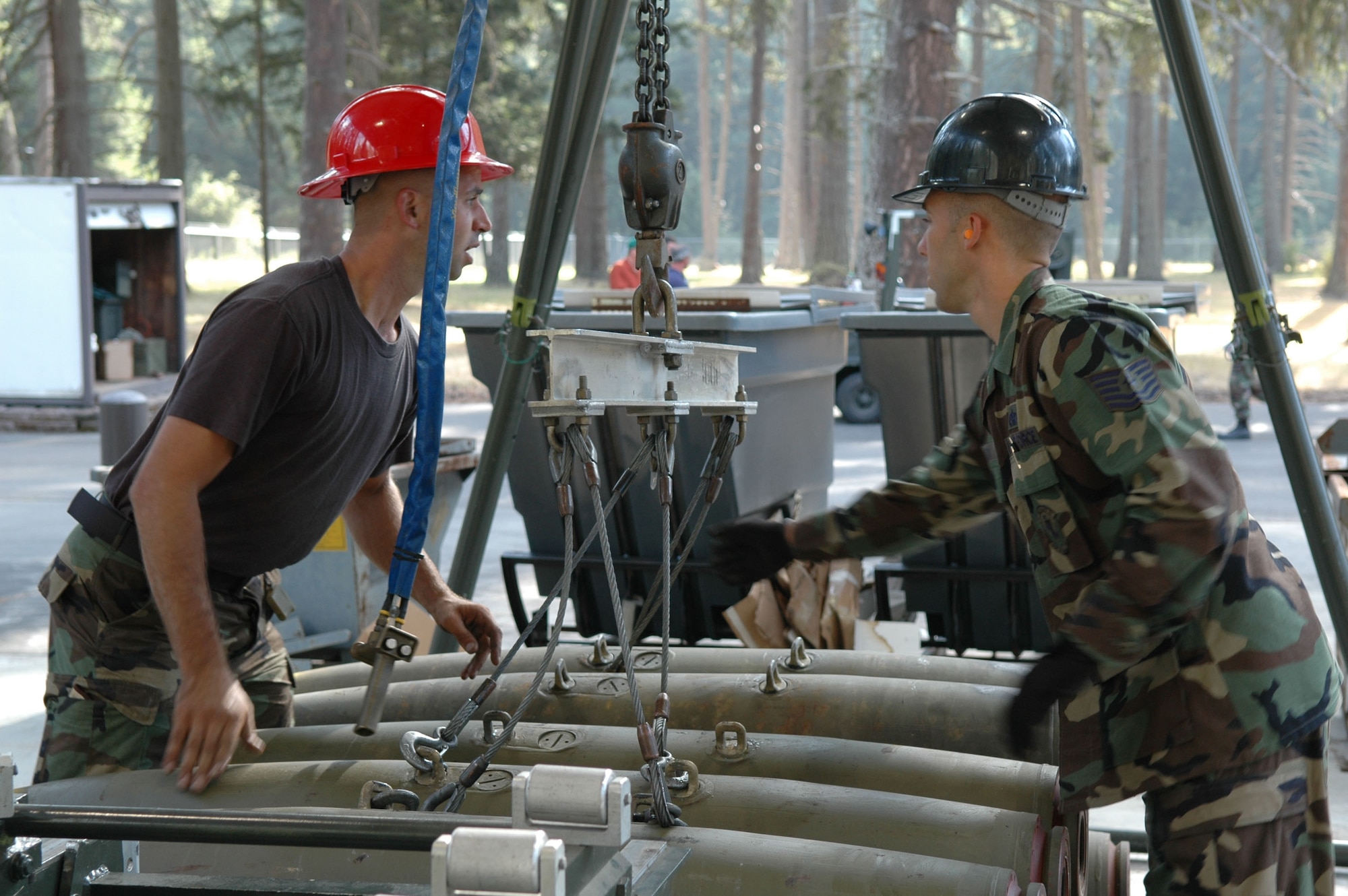 Staff Sgt. Sean Head and Tech.l Sgt. Jamie Clark, both munitions specialist from the  917th Munitions Flight, build MK-82 bombs in support of Operation Patriot Knife, Aug. 7. The 47th Fighter Squadron is deployed to McChord AFB, Wash., where they are dropping live munitions on the Yakima Range for training of A-10 personnel assigned to the 917th Reserve Wing at Barksdale AFB, La. (U.S. Air Force Photo/Senior Master Sgt. Jessica D'Aurizio)