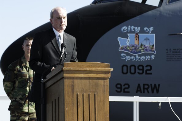 Spokane mayor and honorary wing commander, Dennis Hession, speaks at the 'City of Spokane' unveiling ceremony while Senior Master Sgt. Dan North, 92nd Maintenance Squadron first sergeant looks on.