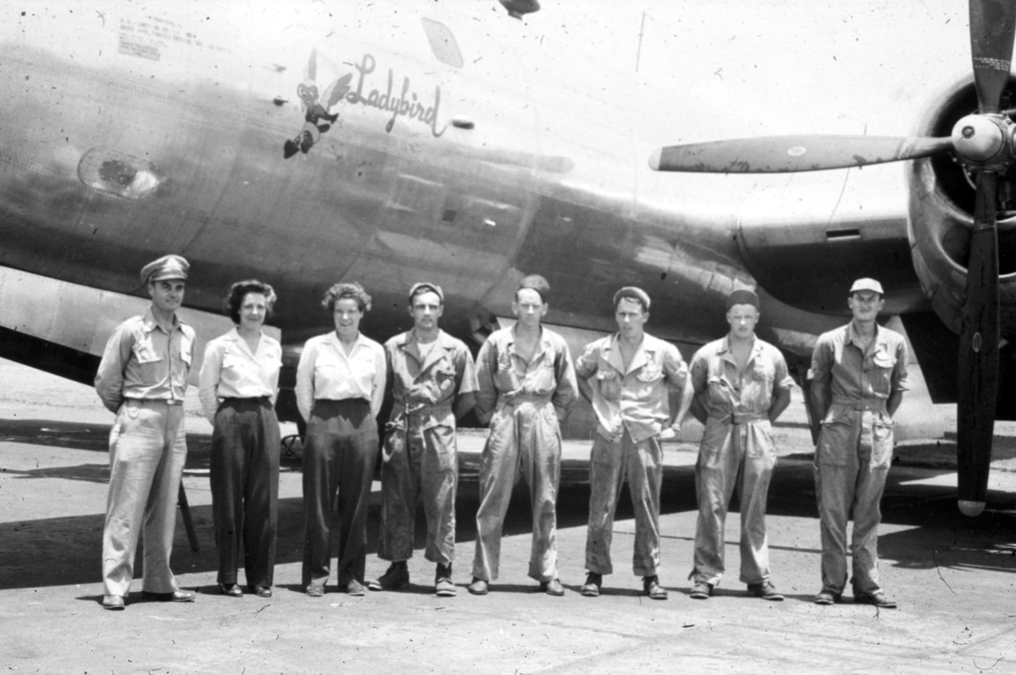 Dora Dougherty, third from left in front of B-29 "Ladybird" with Lt. Col. Paul W. Tibbets, Jr. (left), Dorothea Johnson (2nd from left) and B-29 crew. (U.S. Air Force photo)