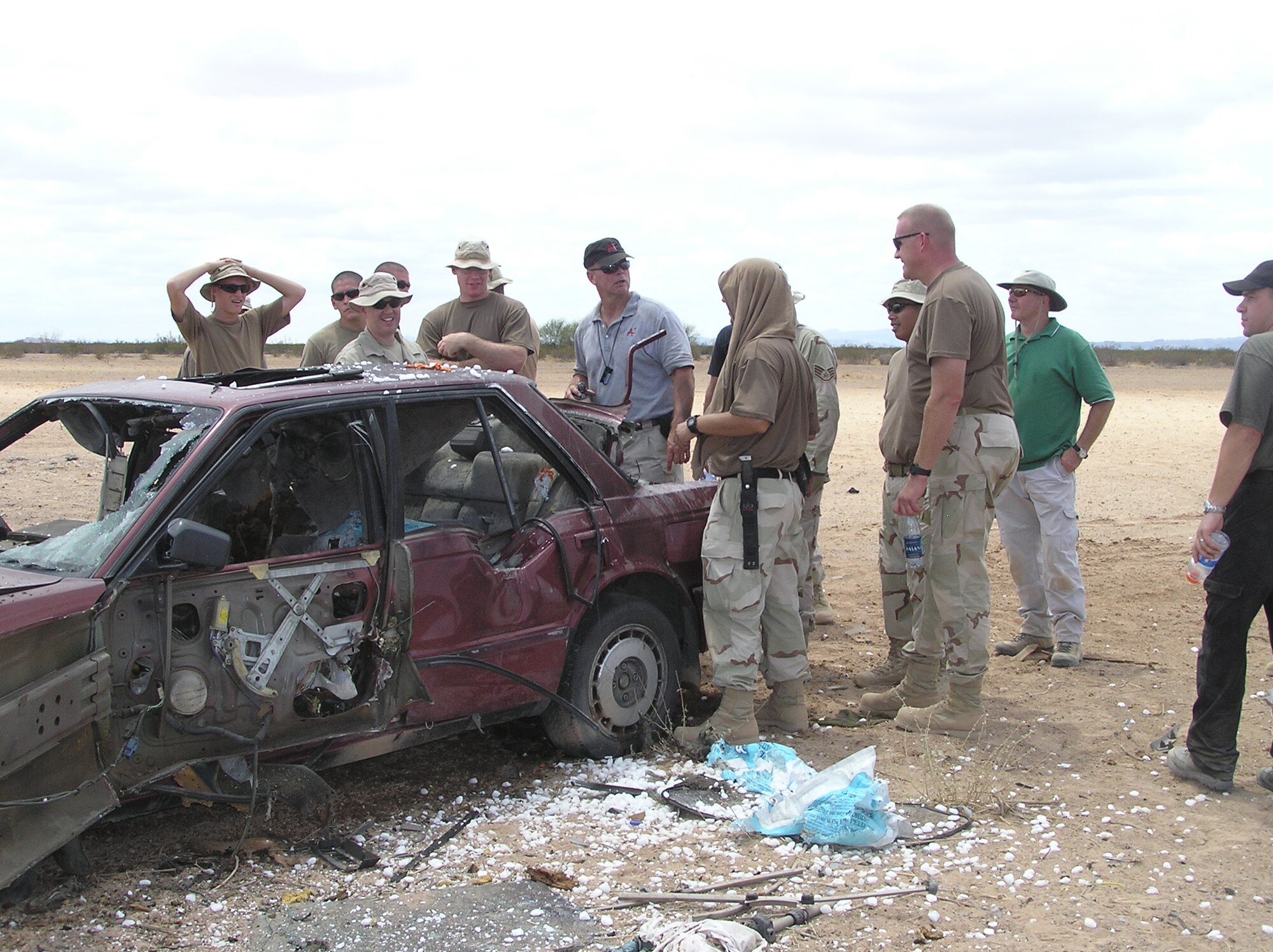 Class participants at the Barry M. Goldwater Range inspect a vehicle that has been blown up by an improvised explosive device similar to those being used in Iraq. (U.S. Air Force photo/Teresa Walker)