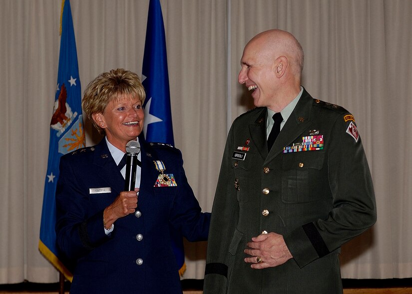Maj Gen Elizabeth A. Harrell, Director of Maintenance and Logistics, Air Combat Command, shares a moment with her fiance, Maj Gen William Grisoldi, Commander, US Army Corps of Engineers, during her retirement ceremony.  Maj Gen Harrell is retiring after 30 years of service.  (USAF photo by TSgt Elizabeth Weinberg)  