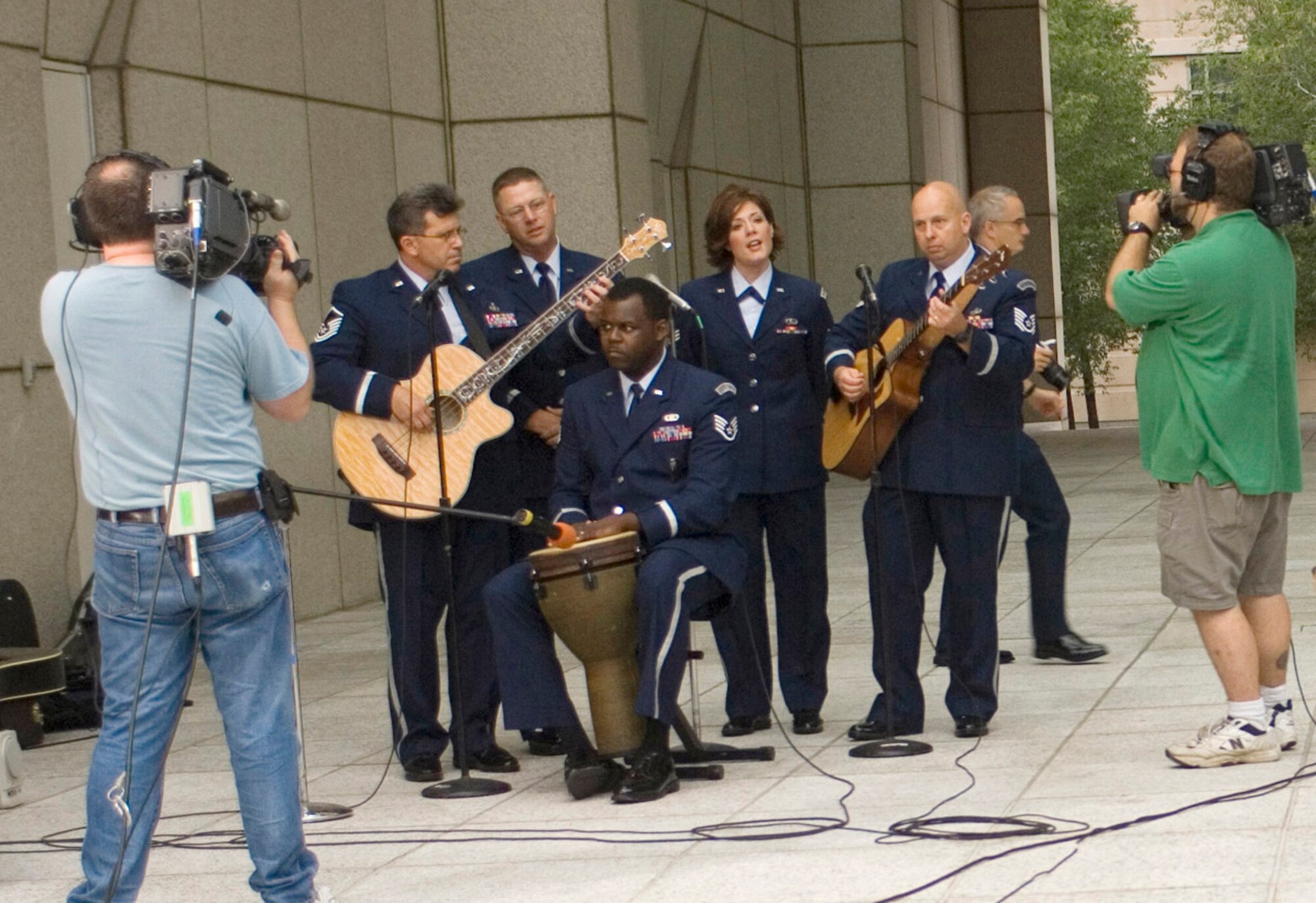 Starlifter, a combo from the Band of Mid-America at Scott Air Force Base, Ill., performs during an appearance on a morning news show in St Louis Aug. 8.  The appearance was one of many Air Force Week activities taking place throughout the St. Louis area during the week. (U.S. Air Force Photo/Master Sgt. Jack Braden)