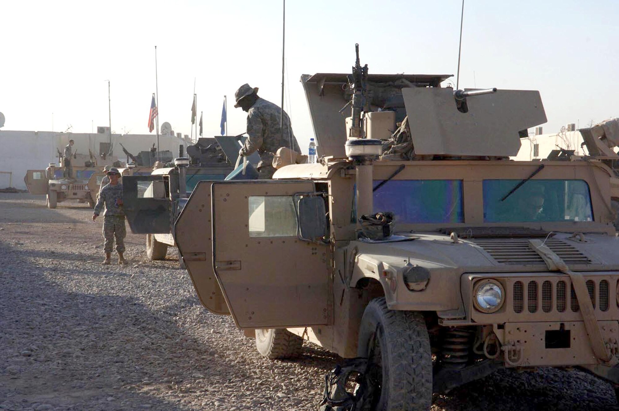 Members of the Tarin Kowt Provincial Reconstruction Team line up their Humvees to get ready for a mission. Every member must undergo combat skills training before they deploy to Afghanistan. (U.S. Air Force photo/Master Sgt. Orville F. Desjarlais Jr.) 
