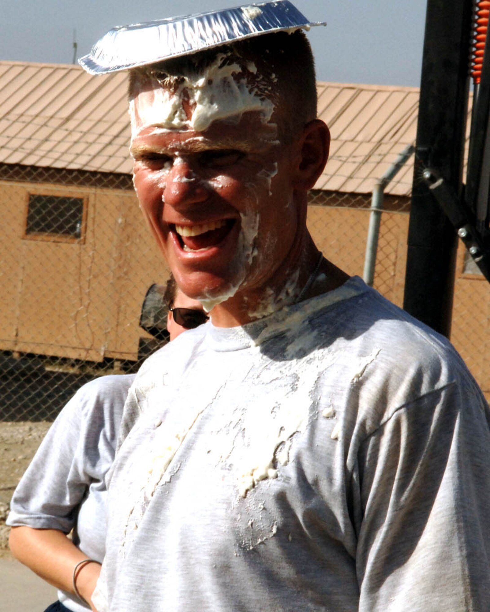 Maj. William Conley smiles after getting a pie in the face.  The fund raiser raised more than $560  (U.S. Air Force photo by Master Sgt. Orville F. Desjarlais Jr.) 