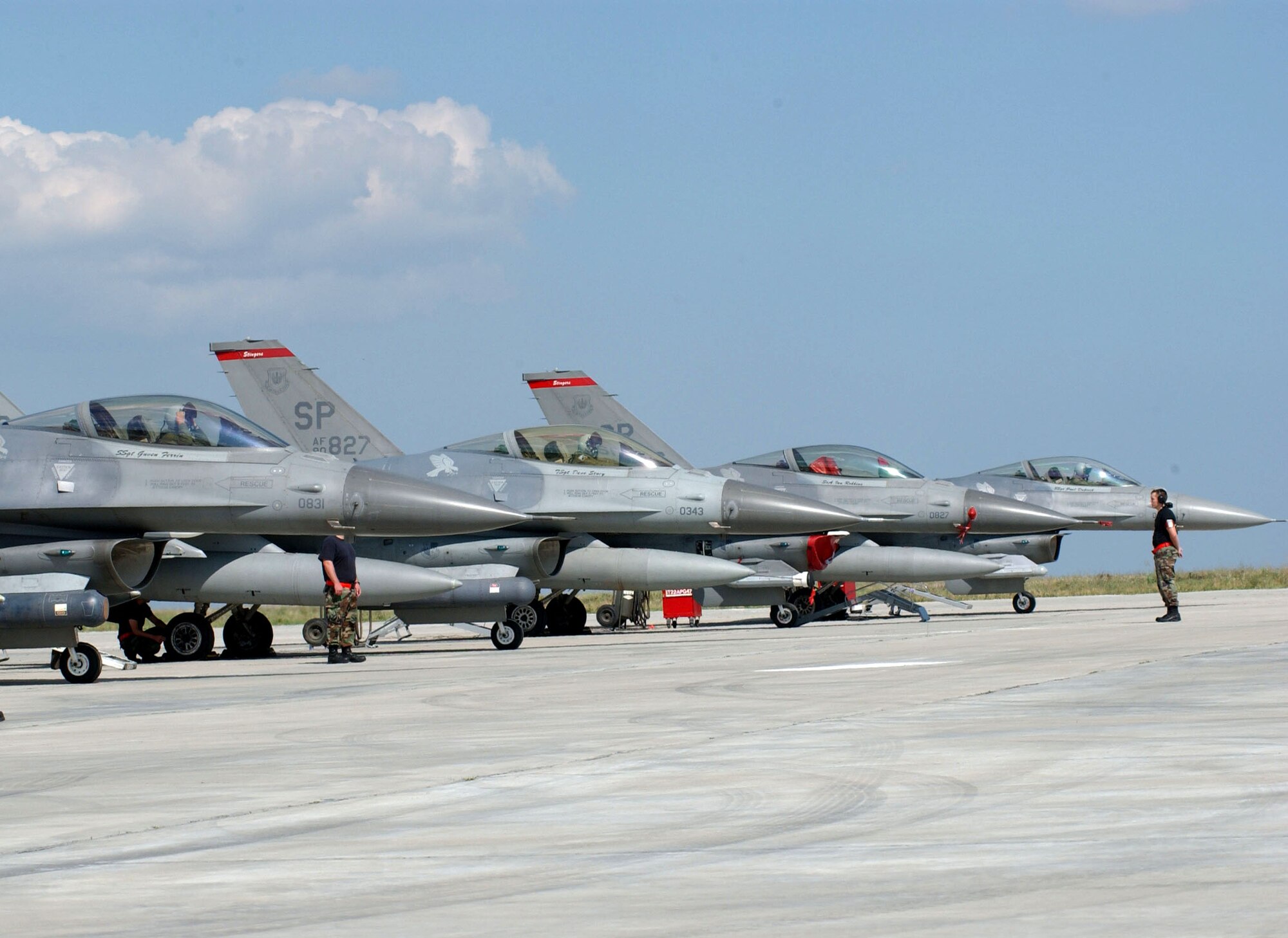 F-16 Fighting Falcons from Spangdahlem Air Base, Germany, are ready for their first mission against the Romanian air force's MiG 21 Lancers at Exercise Viper Lance 2006 at Mihail Kogalniceanu Air Base, Romania, on Aug. 9. This is the first time F-16 crews have trained in Romania. (U.S. Air Force photo/Senior Airman Eydie Sakura) 
