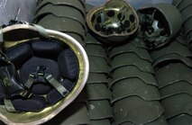 With the St. Louis skyline as a backdrop, Cpl. Morgan E. Johnson (left), rescueman, technical response platoon, watches the Marines observing 'the hole' as Cpl. Ryan 'Ratman' Thompson, rescueman, maintains communication with the St. Louis firefighter rappeling inverted down the chute. During training, the team must maintain audible and visual contact with the person on rappel, just as if they were involved in a real-world scenario. Chemical Biological Incident Response Force tech rescue, of II Marine Expeditionary Force, traveled to St. Louis to train with and support area first responders in their exercise.