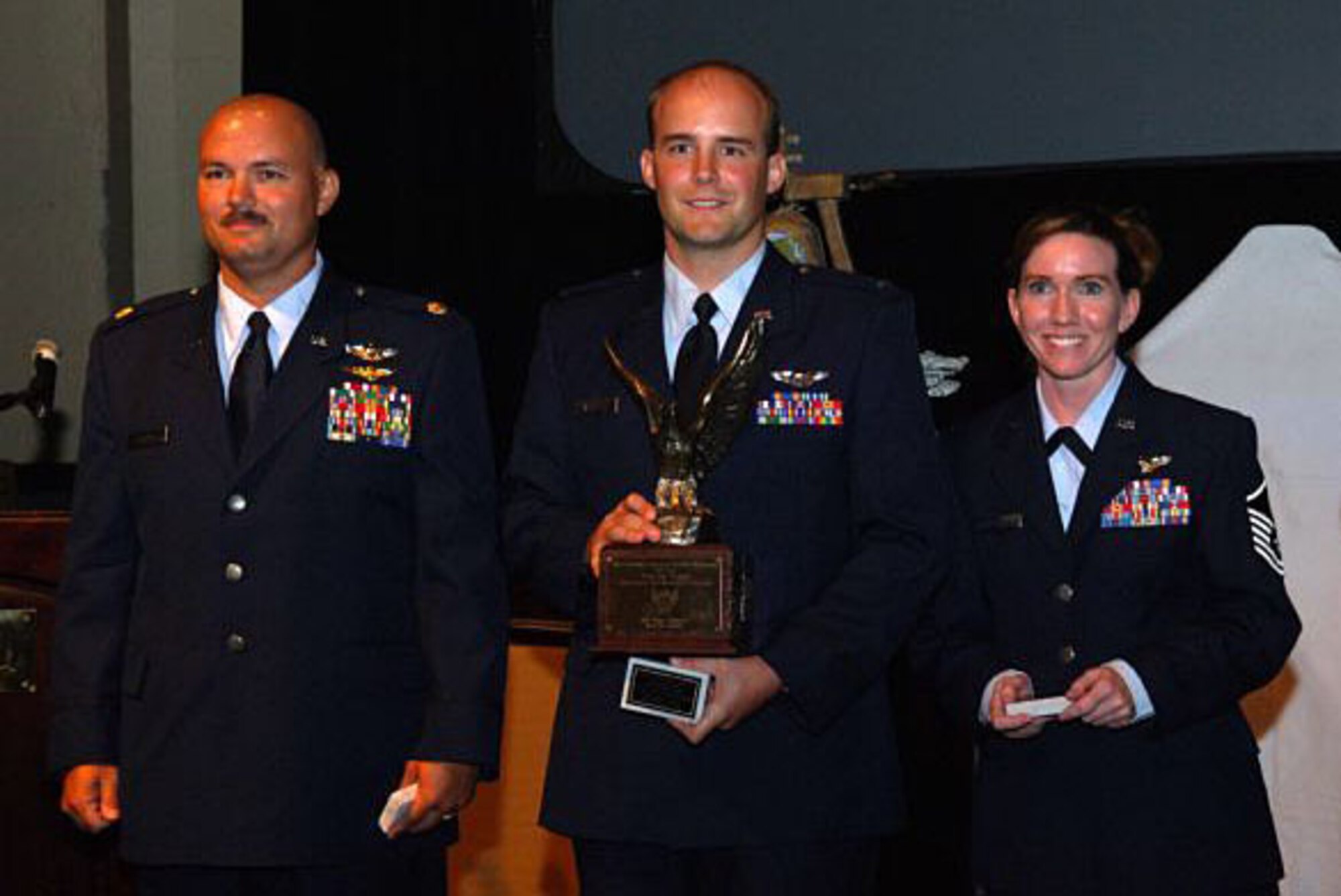Maj. Larry Brown, 1st Lt. Austin Aggson and Master Sgt. Tonya Halenka received the 2005 AFA award; Maj. Byron Rager was unable to attend due to being deployed.