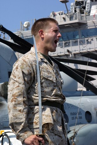 While on board the USS Iwo Jima Marines take part in Corporal's Course on the flight deck. This course gives Marines training in sword manual, troop formations, and various different aspects that come with being an Non-Commissioned Officer (NCO) in the United States Marine Corps (USMC). (US Marine Corps photo by Lance Corporal Andrew J. Carlson)