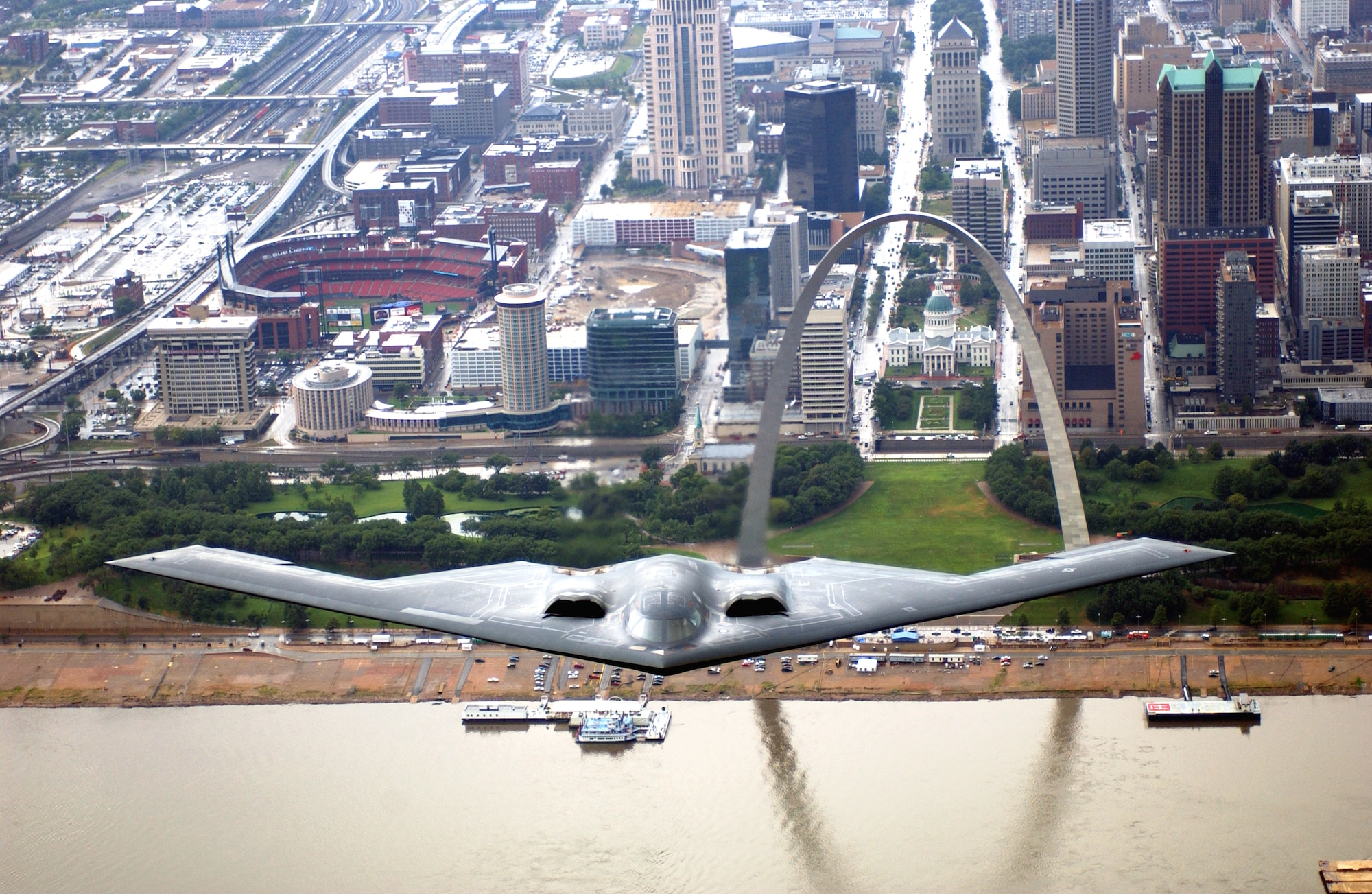 A B-2 Stealth bomber from the 509th Bomb Wing at Whiteman Air Force Base, Mo., flies over the St. Louis Arch on Aug. 10. The B-2 flyover was one of several events celebrating Air Force Week in St. Louis. (U.S. Air Force photo/Tech. Sgt. Justin D. Pyle)