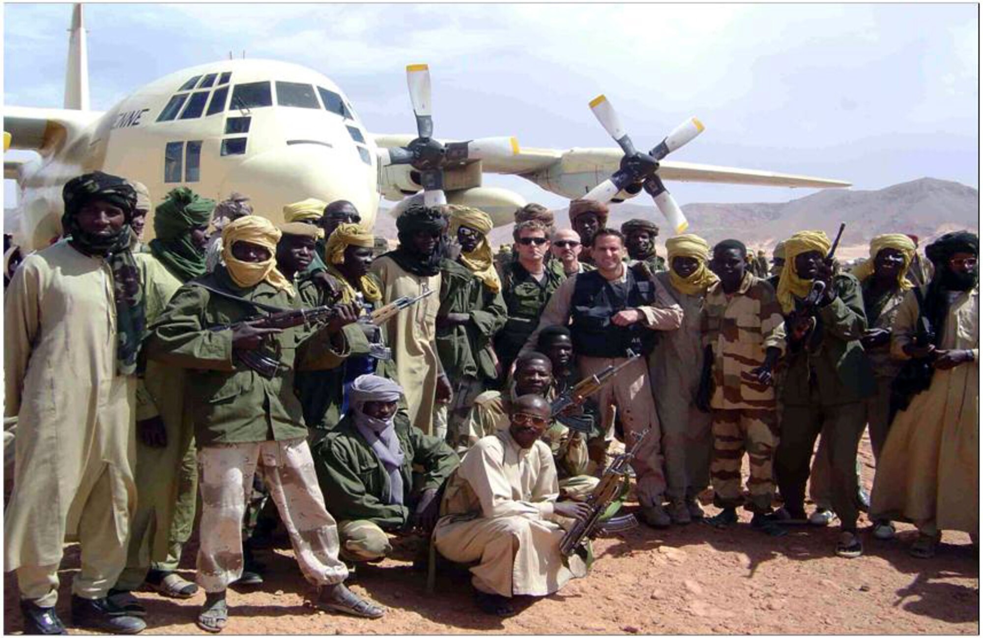 Members from the 6th Special Operations Squadron pose with tribal security forces and Chadian air force counterparts in the Shara desert. The 6th SOS assess, trains, advises and assists foreign nation aviation forces worldwide. (Courtesy photographs)
