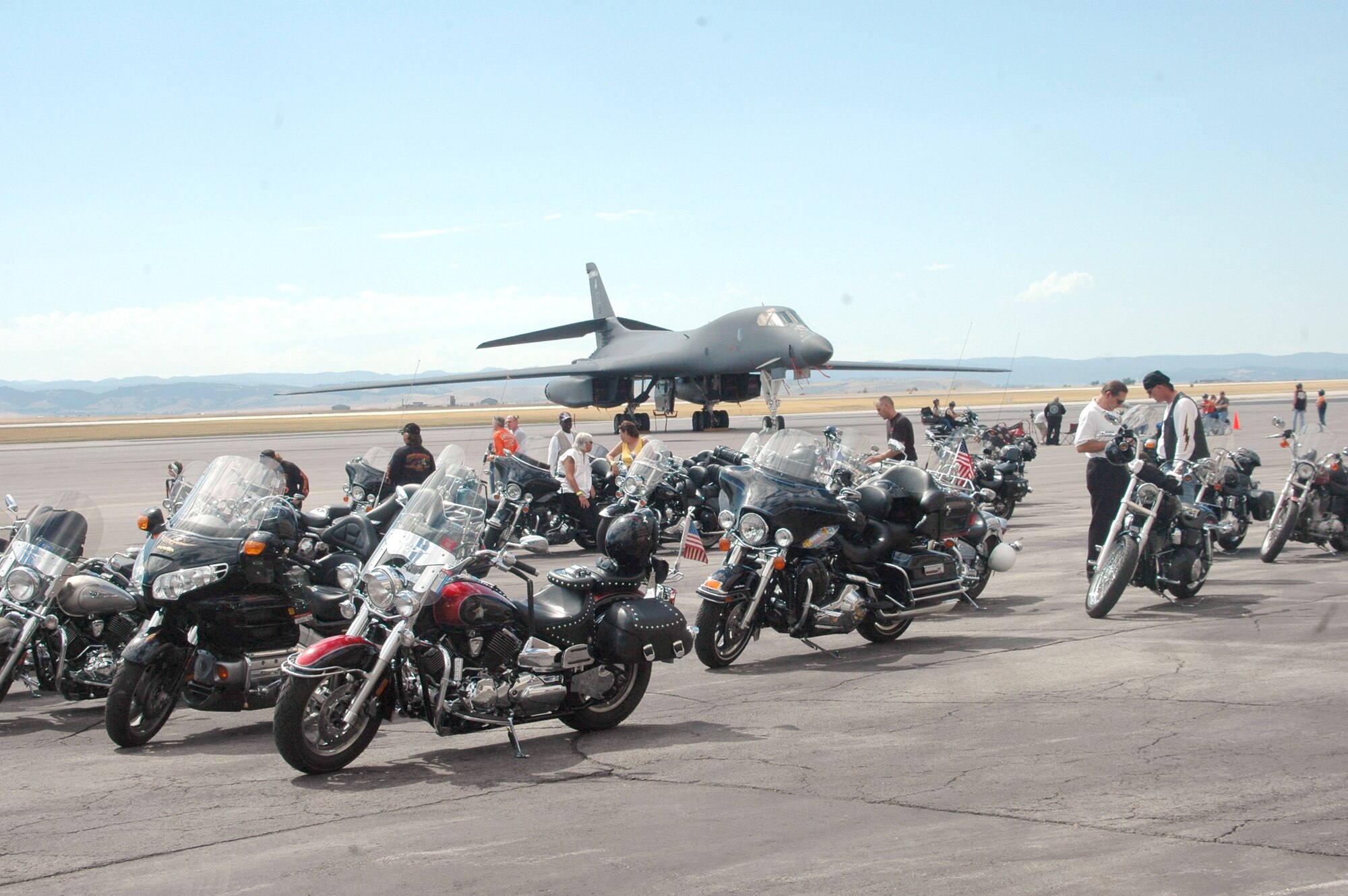 Members of the Ellsworth Dakota Thunder Motorcycle Club toured a static display of a B-1 Lancer at Ellsworth Air Force Base, S.D., on Aug. 8. Members of the local motorcycle club also had a chance to park their motorcycles in front of the aircraft for photo opportunities. Following the tour, nearly 200 riders from Ellsworth and the surrounding communities began their annual ride to the 66th Annual Sturgis Motorcycle Rally, which lasts through Aug. 13 at nearby Sturgis. (U.S. Air Force photos/Airman Kimberly Limrick)