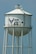 Contractors paint Westover's 1940's-era water tower under scorching heat Aug. 2.  The repainting was a base civil engineering project aimed at prolonging the life of the tower.  The 500,000 gallons of water in the tower supplement the base water supply in caser of fire.  Workers completed the project Aug. 3. 