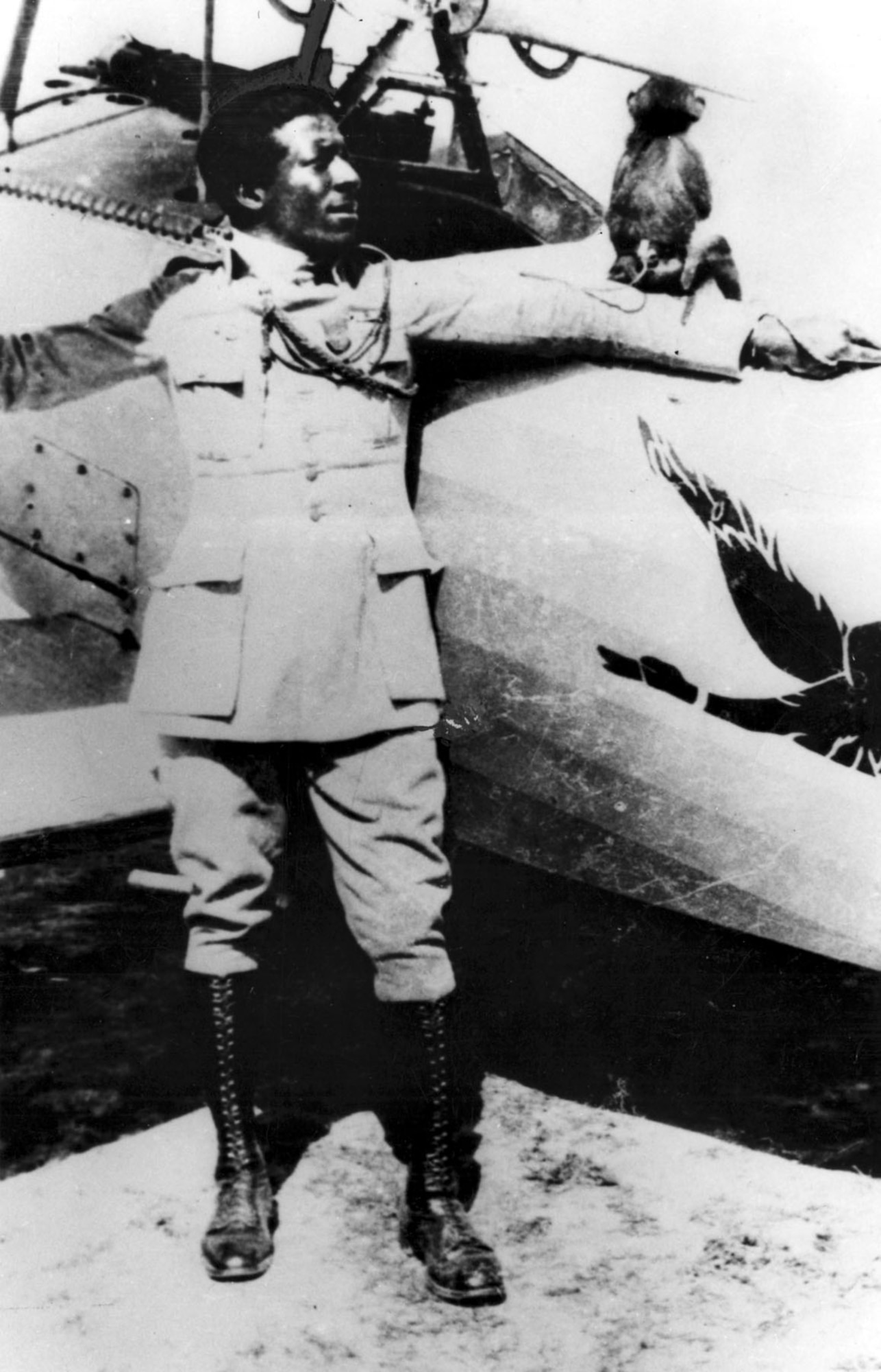 Eugene Bullard with his pet monkey “Jimmy” beside a Nieuport 24 fighter of the 93rd Squadron (Escadrille) in August or September 1917. He flew with Jimmy tucked inside his coat on every combat mission. (U.S. Air Force photo)