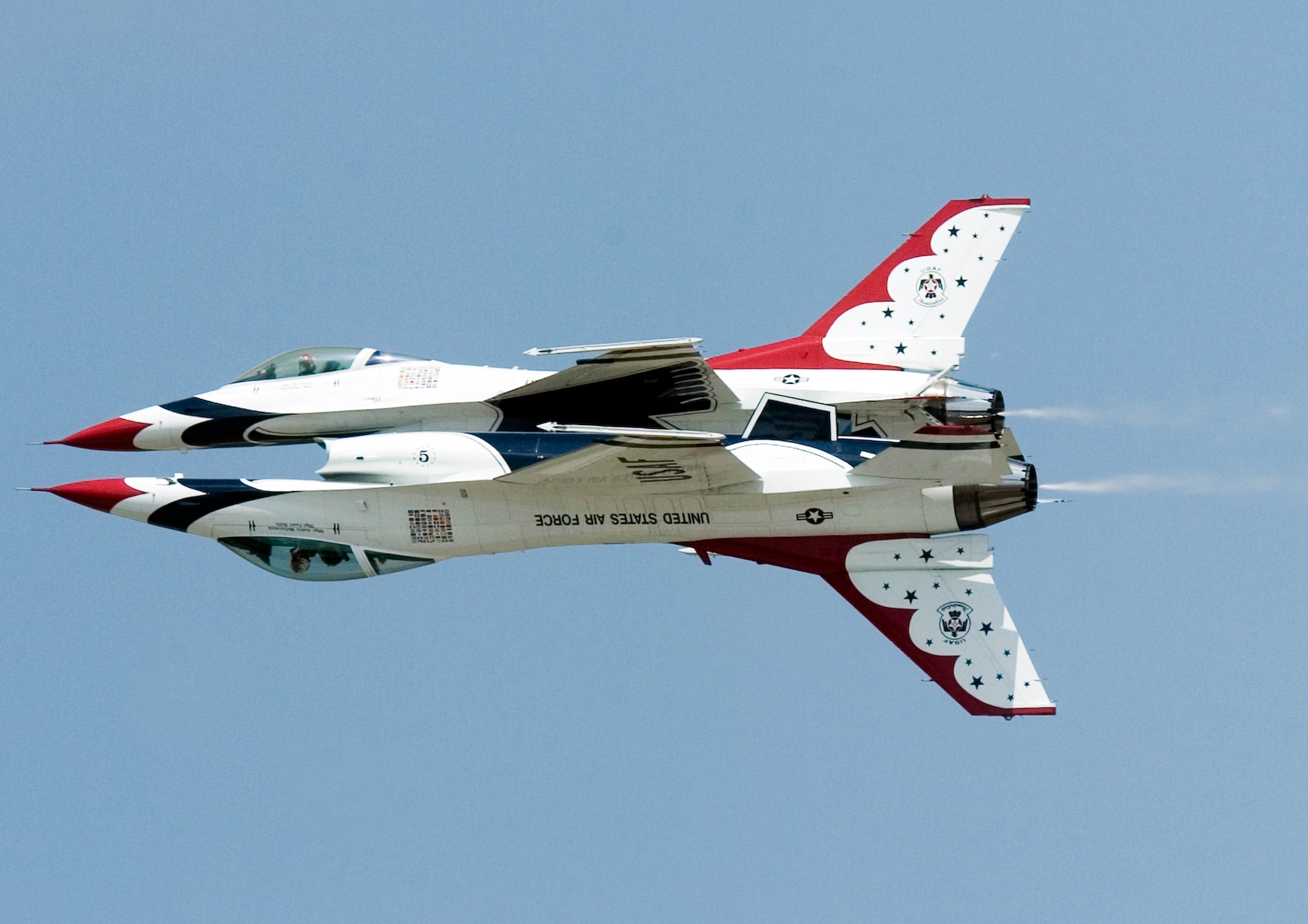 Thunderbirds No. 5 and 6 perform a reflection pass during a practice show at Scott Air Force Base, Ill., on Aug. 11. (U.S. Air Force photo/Master Sgt. Jack Braden)