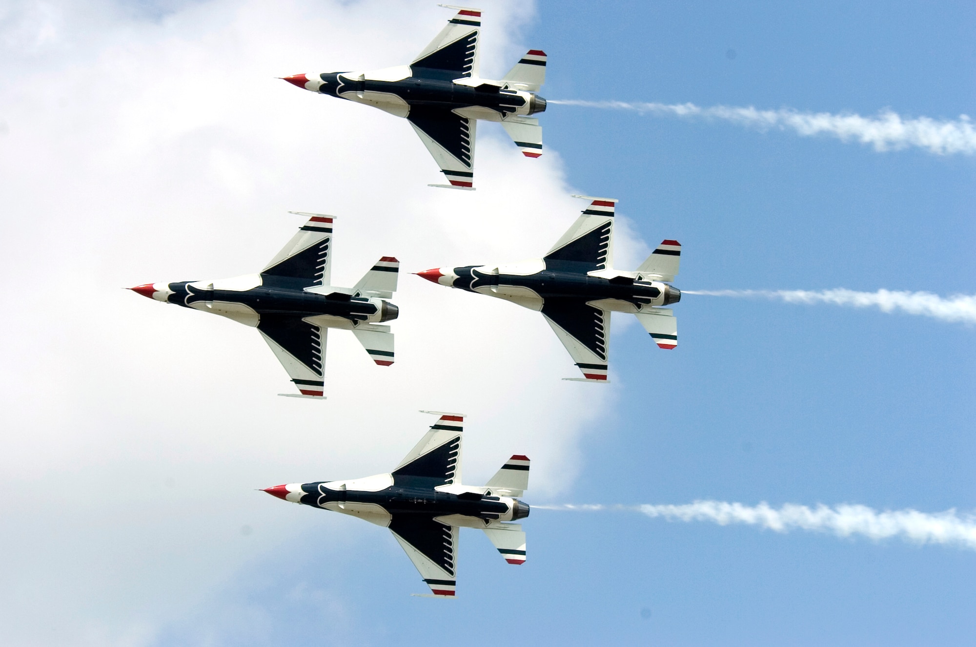 The Thunderbird diamond formation passes in review during a practice show at Scott Air Force Base, Ill., on Aug. 11. (U.S. Air Force photo/Master Sgt. Jack Braden)
