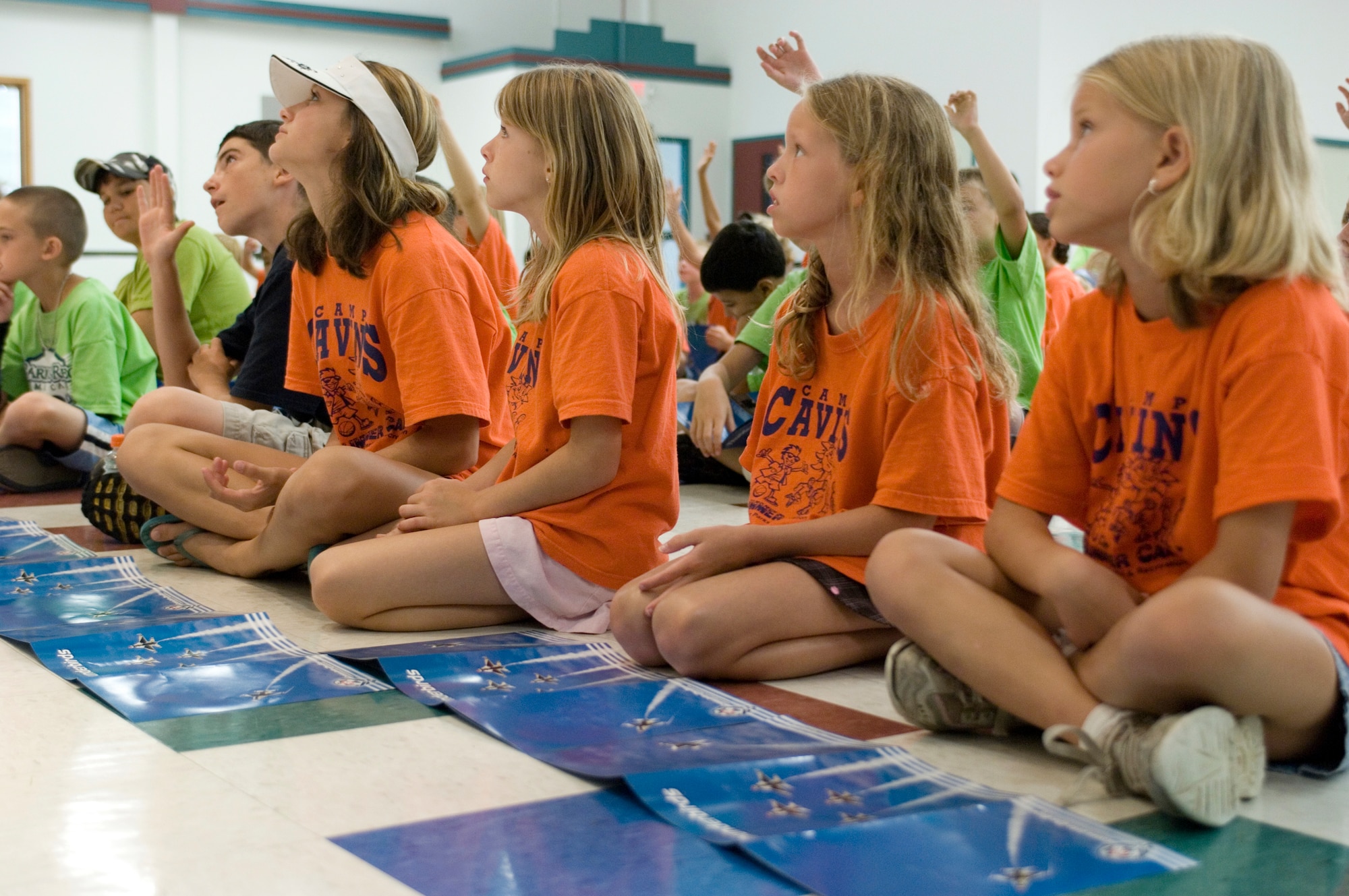 Children attending the Caty Cavins Community Center Summer Camp in O'Fallon, Ill., on Aug. 11 listen as Maj. Brian Farrar of the Thunderbirds, the U.S. Air Force Air Demonstration Squadron, tells what it is like to be a fighter pilot. Major Farrar is Thunderbird No. 5 and lead solo for this year's team. The camp visit was part of Air Force Week community activities in the St. Louis area. (U.S. Air Force photo/Master Sgt. Jack Braden)
