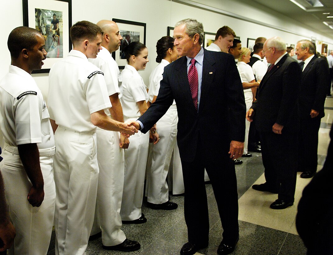President George W. Bush, Vice President Dick Cheney and Secretary of Defense Donald H. Rumsfeld greet troops at the Pentagon, Aug. 14, 2006. 