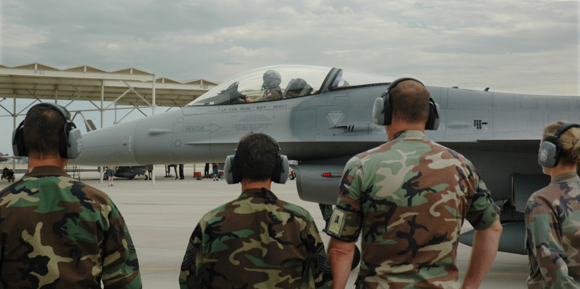 Members of the 944th Fighter Wing watch as F-16, tail number 86-273, takes off Aug. 15 to Hill Air Force Base, Utah, where the F-16 will undergo Falcon Star, a life extending set up of upgrades. Following these upgrades, the F-16 will go to its new home at Nellis Air Force Base, Nev. This F-16 is the first of the 944th Fighter Wing's 17 F-16s that are being reassigned as part of Base Realignment and Closure. (U.S. Air Force photo/Staff Sgt. Stephen Razo)