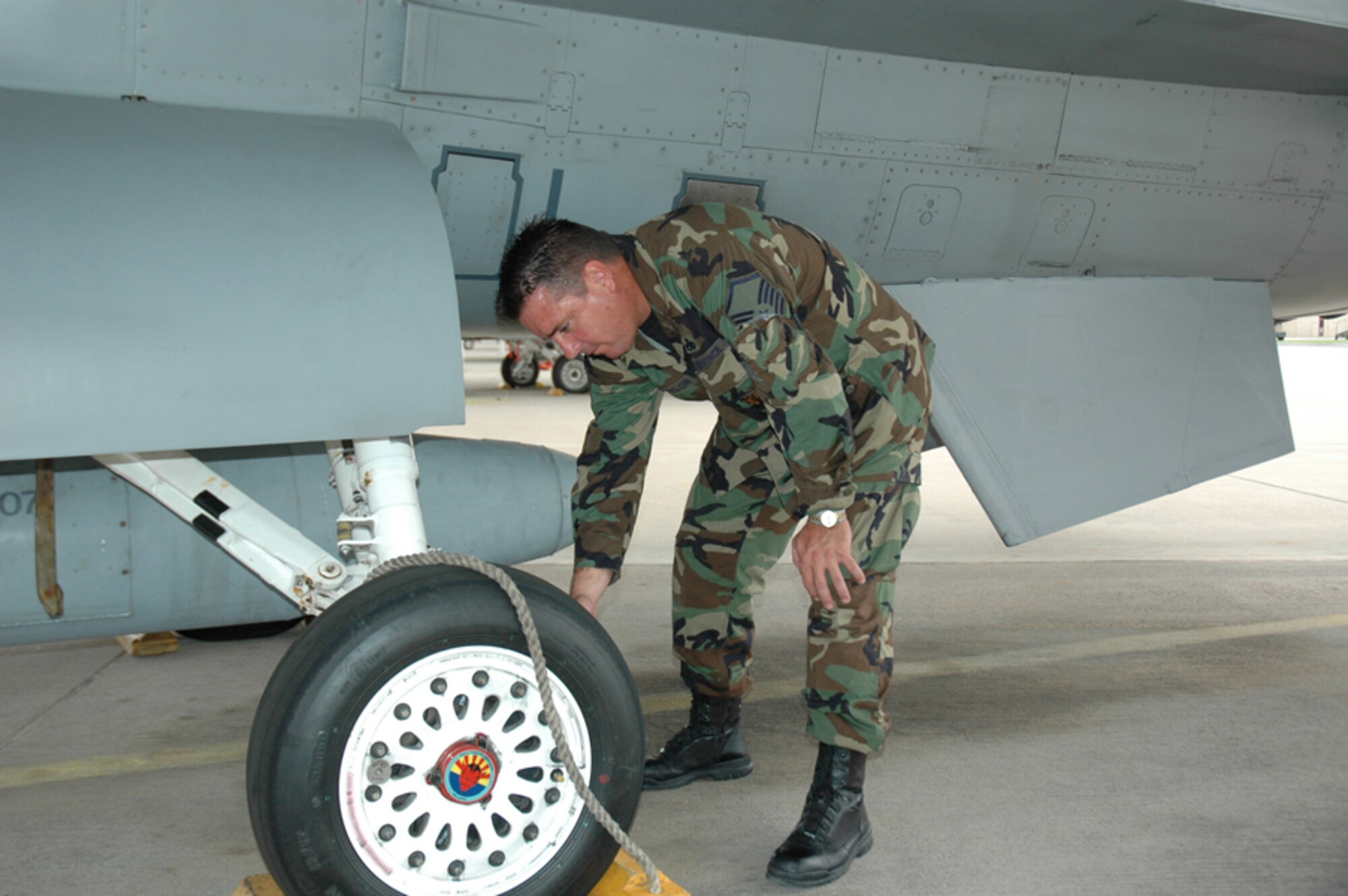 Master Sgt. Rob Taylor, 944th Maintenance Group crew chief, does checks on tail number 86-273 prior its take off Aug. 15 to Hill Air Force Base, Utah, where the F-16 will undergo Falcon Star, a life extending set up of upgrades. Following these upgrades, the F-16 will go to its new home at Nellis Air Force Base, Nev. This F-16 is the first of the 944th Fighter Wing's 17 F-16s that are being reassigned as part of Base Realignment and Closure. (U.S. Air Force photo/Staff Sgt. Stephen Razo)