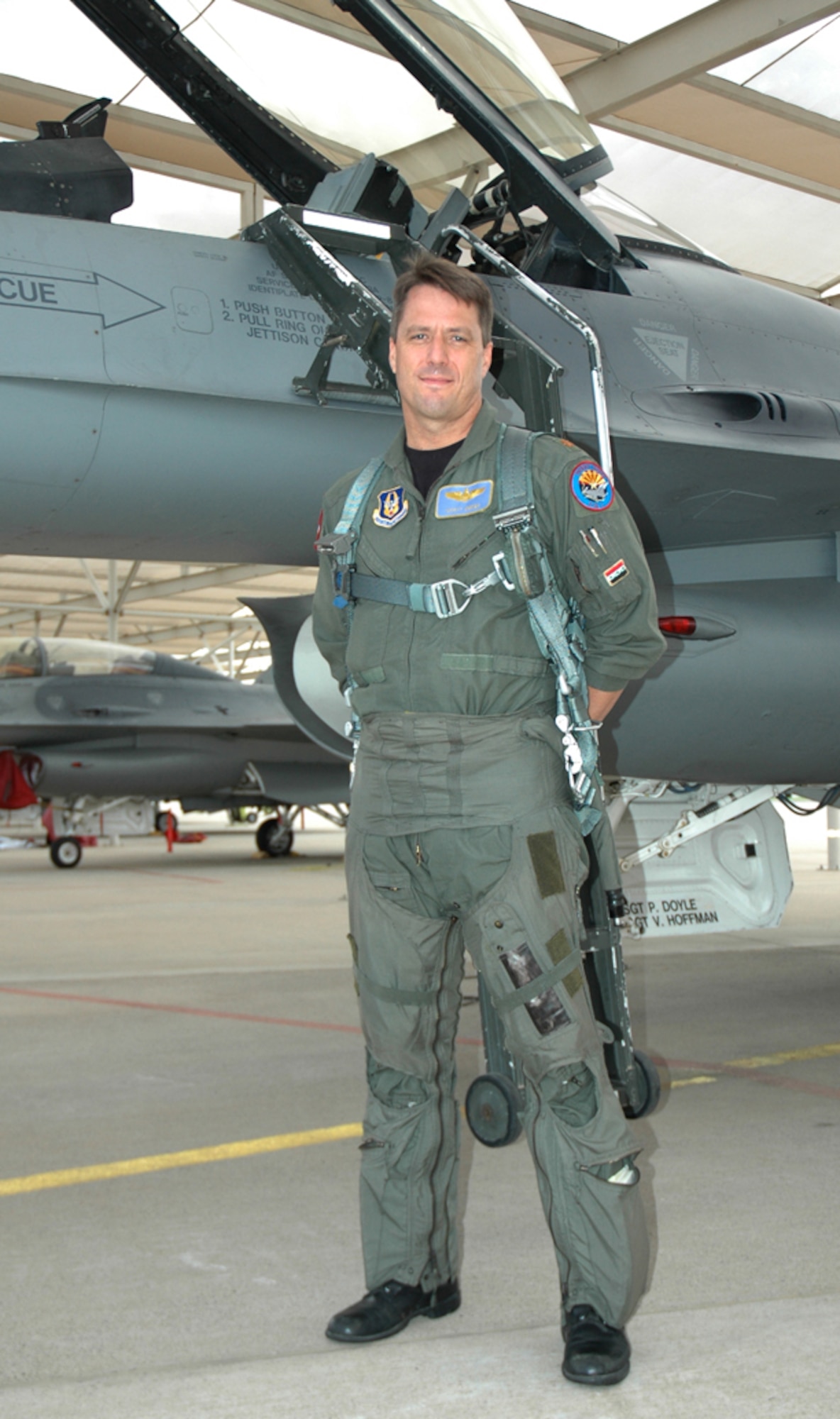 Maj. Scott Crogg, 302nd Fighter Squadron pilot, stands in front of tail number 86-273 prior to taking off Aug. 15 to Hill Air Force Base, Utah, where the F-16 will undergo Falcon Star, a life extending set up of upgrades. Following these upgrades, the F-16 will go to its new home at Nellis Air Force Base, Nev. This F-16 is the first of the 944th Fighter Wing's 17 F-16s that are being reassigned as part of Base Realignment and Closure. (U.S. Air Force photo/Staff Sgt. Stephen Razo)