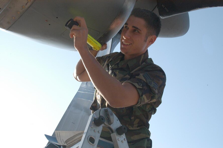 Senior Airman Mike Sevilla, 317th Aircraft Maintenance Squadron, checks an engine?s intake. The smallest of debris could destroy the engine and put lives in jeopardy.                                