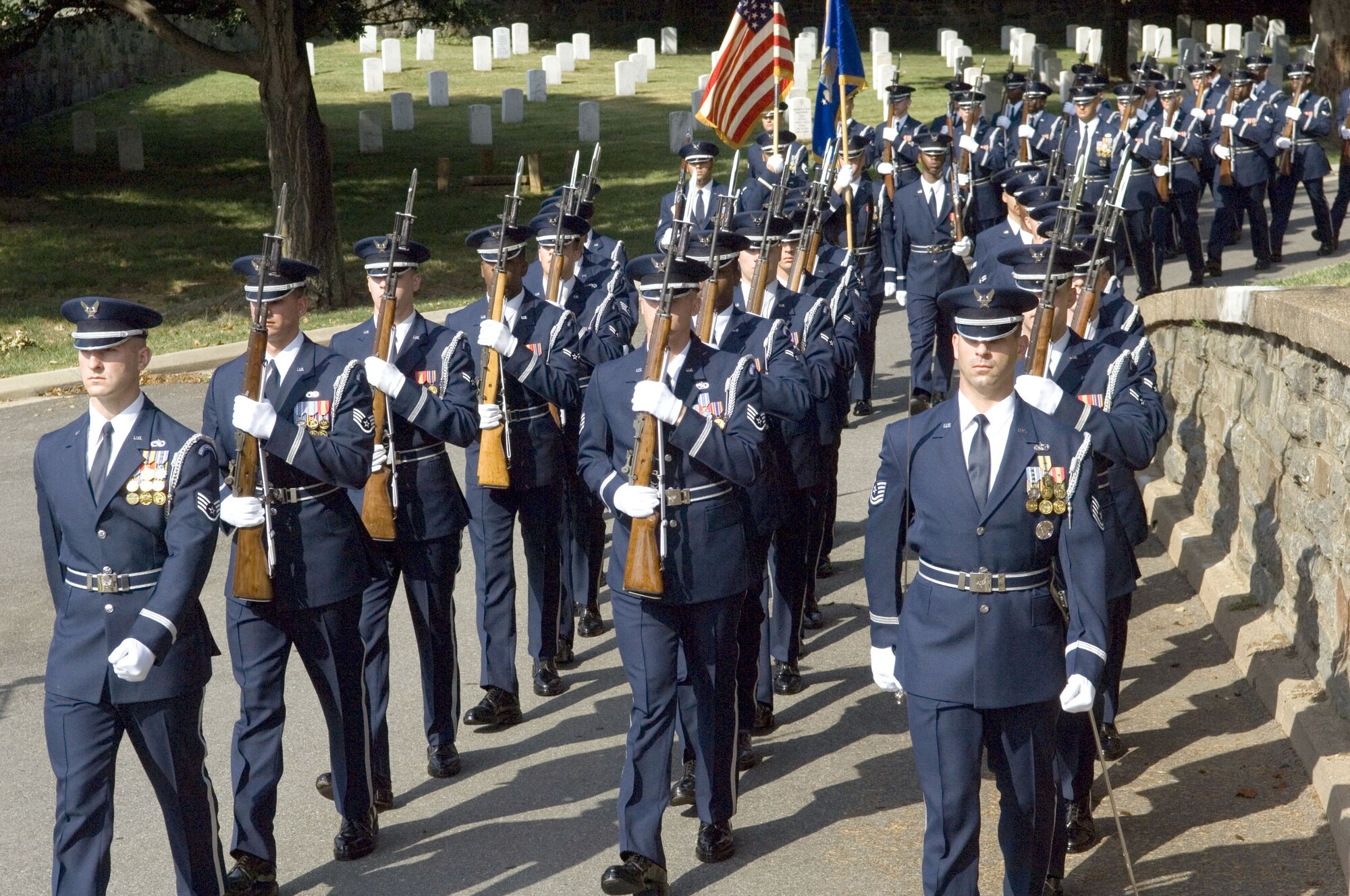 The U.S. Air Force Honor Guard marches in the funeral procession for retired Maj. Gen. Jack I. Posner at Arlington National Cemetery on Aug. 11. General Posner was among the last bomber pilots to have served in World War II. (U.S. Air Force photo/Tech. Sgt. Cohen A. Young) 


