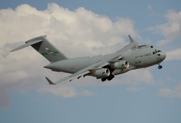 A C-17 from McChord AFB, Wash., makes a tight turn to runway heading at Nellis AFB, Nev. Aug. 14 during a Red Flag exercise. Red Flag, which ends Sept. 2, puts up to 80 aircraft in the air at one time to train crews in large-force operations in a highly realistic combat environment. (Photo courtesy Paul Ridgway)