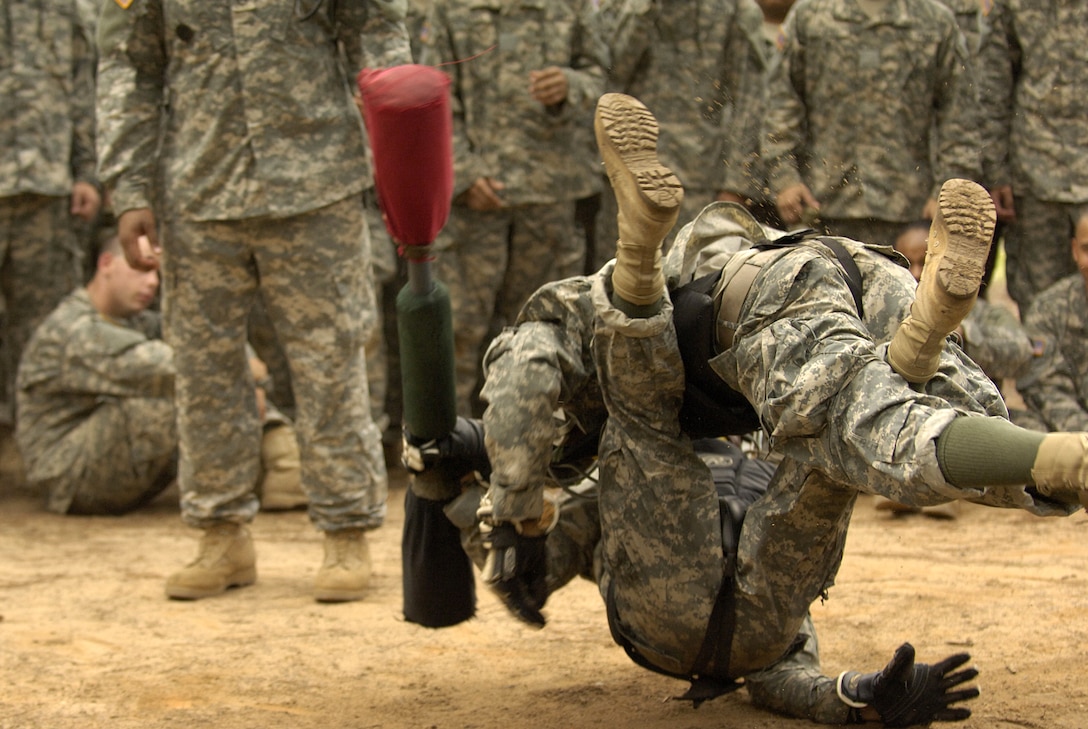U.S. Army privates compete in a hand-to-hand combat competition during Army basic training at Fort Jackson, S.C., Aug. 9, 2006. 