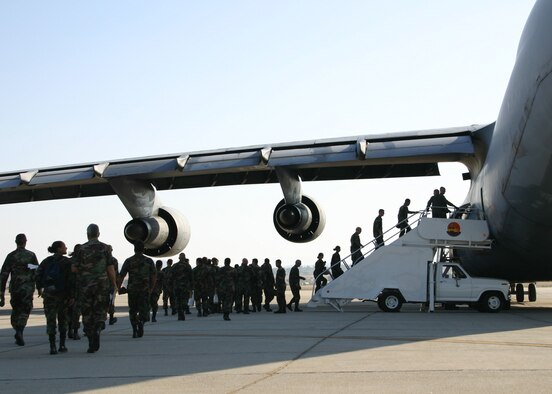 Members of the 482nd Fighter Wing board a C-5A “Galaxy” at March Air Reserve Base, Calif. after a short layover on their way to Hickam AFB, Hawaii Aug. 13 for exercise Cactus Aloha. (US Air Force photo by Master Sgt. Ray Sarrracino)
