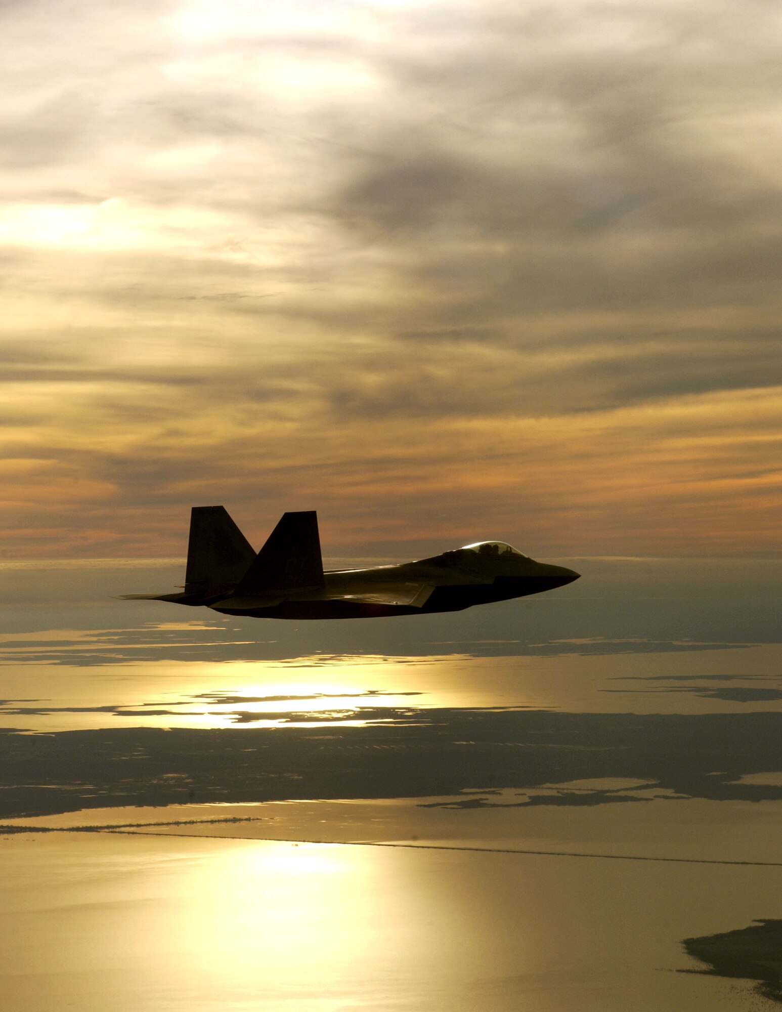 An F-22 Raptor from Nellis Air Force Base, Nev., flies over Kill Devil Hills, N.C. (U.S. Air Force photo by Tech. Sgt. Ben Bloker)