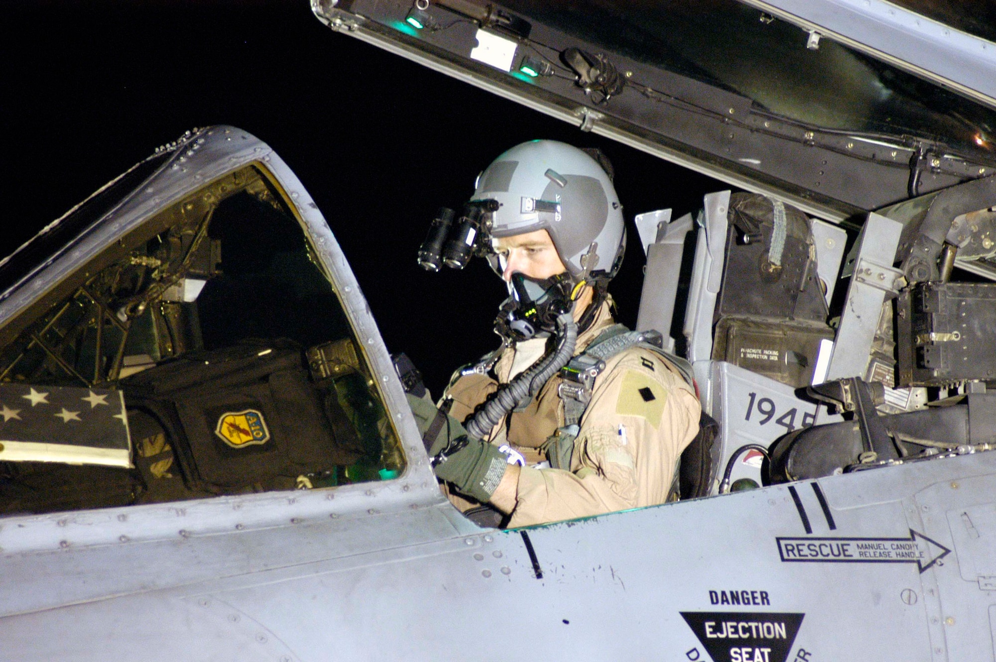 Capt. Rick Mitchell, an A-10 Thunderbolt II pilot at Bagram Airfield, Afghanistan?s 81st Expeditionary Fighter Squadron, prepares for a nighttime combat mission in early August.  Captain Mitchell is deployed from the 442nd Fighter Wing at Whiteman AFB, Mo.  The 81st EFS flies combat sorties around the clock to provide close air support for U.S. and Coalition ground forces in Afghanistan. (US Air Force photo/Maj. David Kurle)