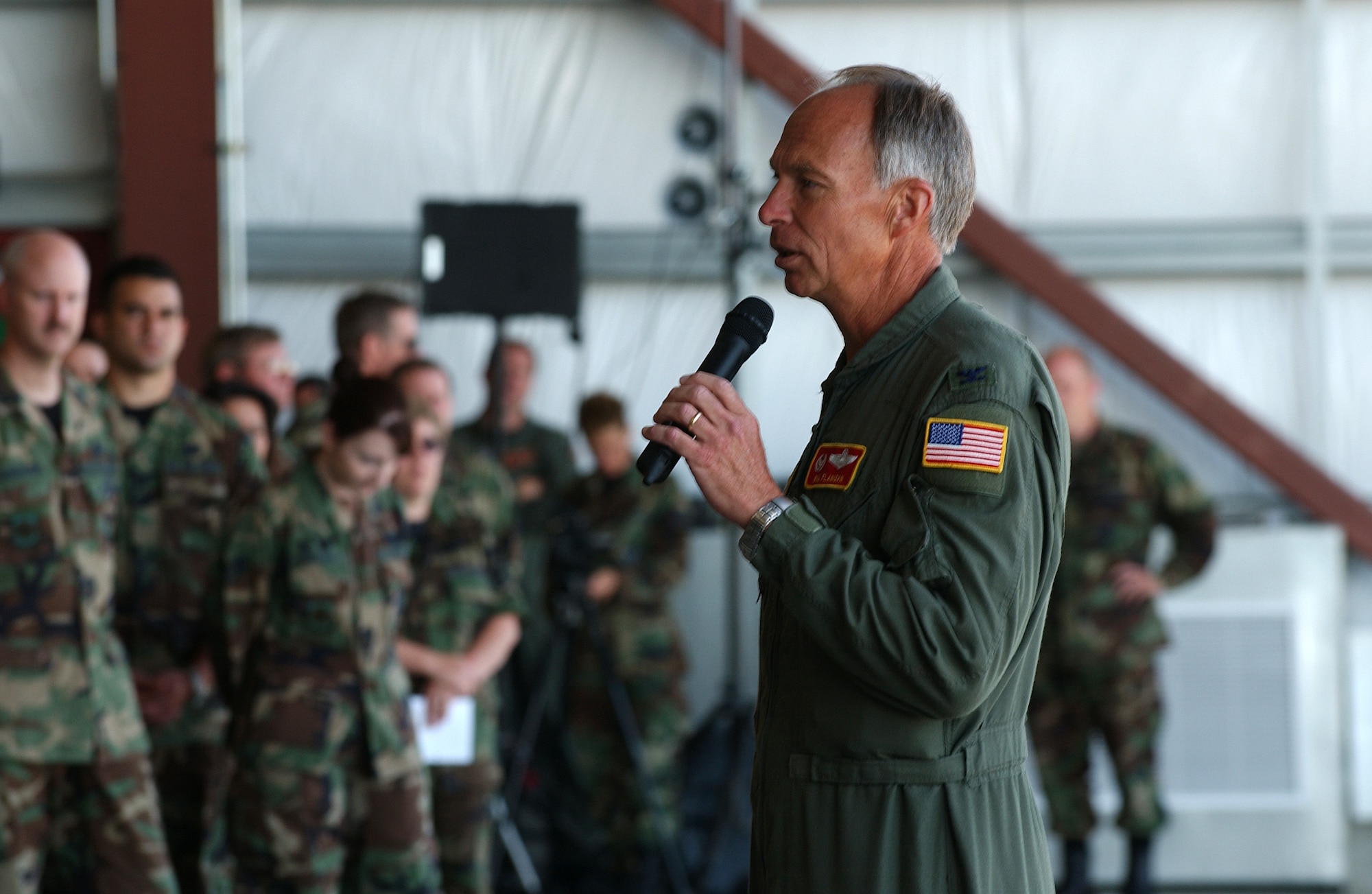 Col. William N. Flanigan, 939th Air Refueling Wing commander, addresses reservists assigned to Portland before the KC-135 aircraft take off from Oregon for the last time. The 939th has operated out of Portland for more than 40 years, first as rescue unit and then as a refueling unit. (U.S. Air Force photo/Staff Sgt. Jorge A. Rodriguez)