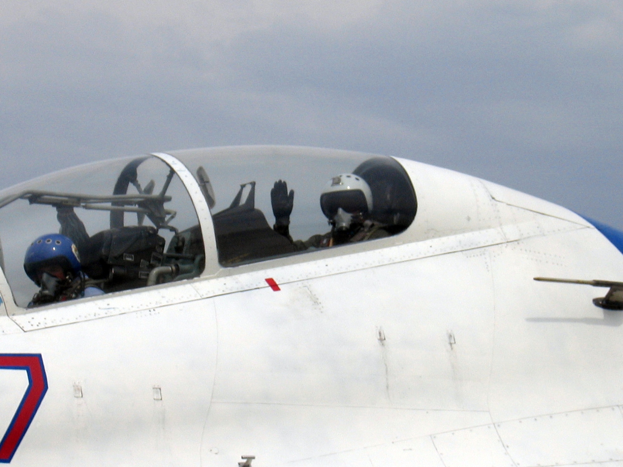 Gen. Tom Hobbins, U.S. Air Forces in Europe commander, waves from the backseat of a Russian SU-27 Flanker piloted by Gen. Maj. Aleksandr Kharchevskiy, chief of the 4th Center for Combat Use and Flight Training, on Aug. 15. General Hobbins, who is in Russia Aug. 14 to 17 to bolster relationships and security cooperation between U.S. and Russian air forces, also flew in a MiG-29 Fulcrum during his visit to Lipetsk Air Base. (U.S. Air Force photo/Capt. Russell Montante) 
