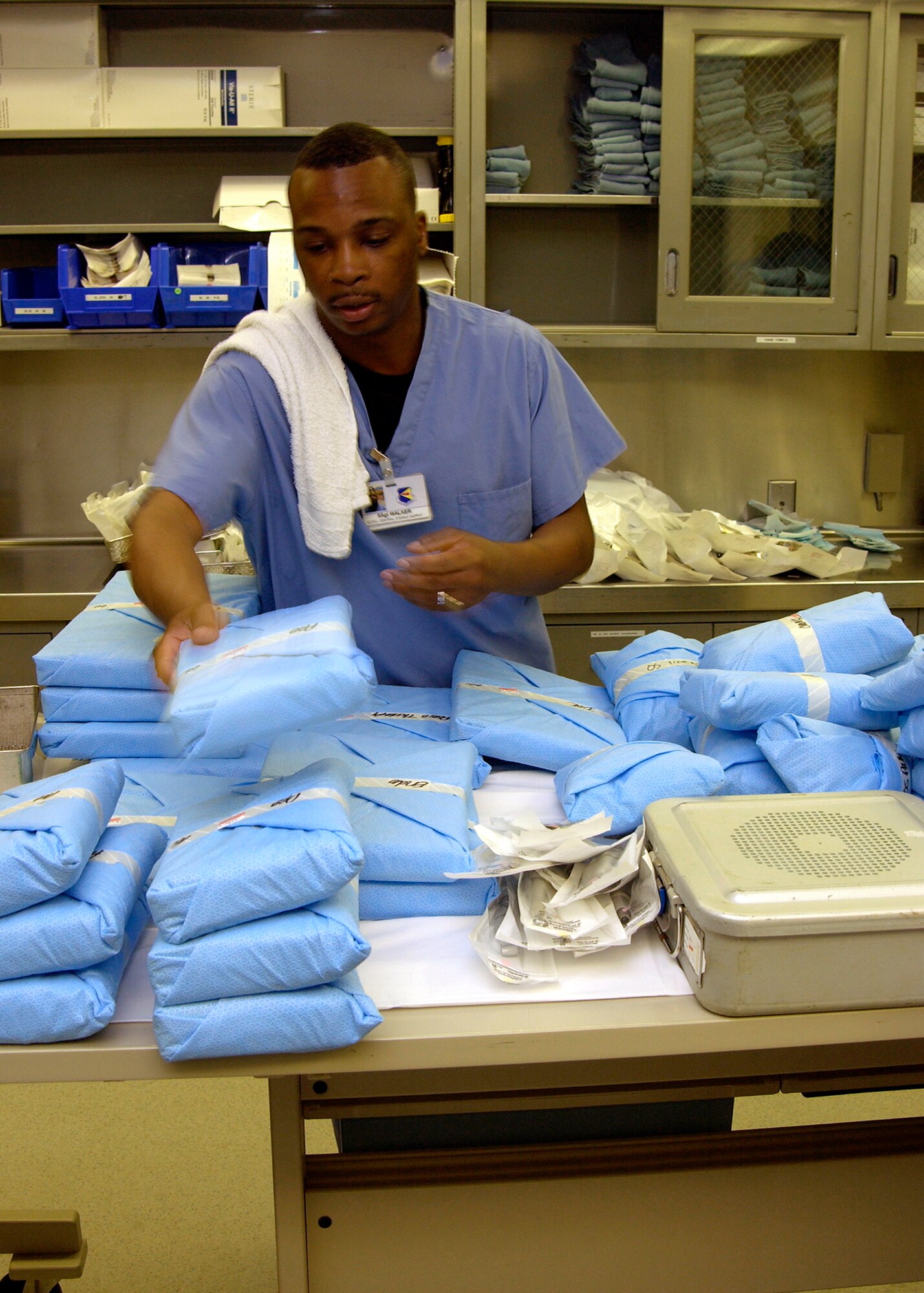 Staff Sgt. Bobby Walker sorts dental instruments and prepares them for sterilization at Davis-Monthan Air Force Base, Ariz., on Aug. 10. The 355th Dental Squadron provides services for more than 7,000 active-duty Airmen at Davis-Monthan so that they may remain mission ready. (U.S. Air Force photo/Airman Gary Walker) 
