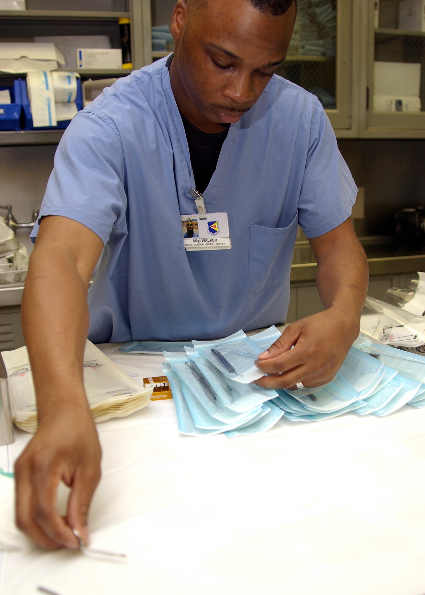 Staff Sgt. Bobby Walker sorts dental instruments and prepares them for sterilization at Davis-Monthan Air Force Base, Ariz., on Aug. 10. The 355th Dental Squadron provides services for more than 7,000 active-duty Airmen at Davis-Monthan so that they may remain mission ready. (U.S. Air Force photo/Airman Gary Walker) 

