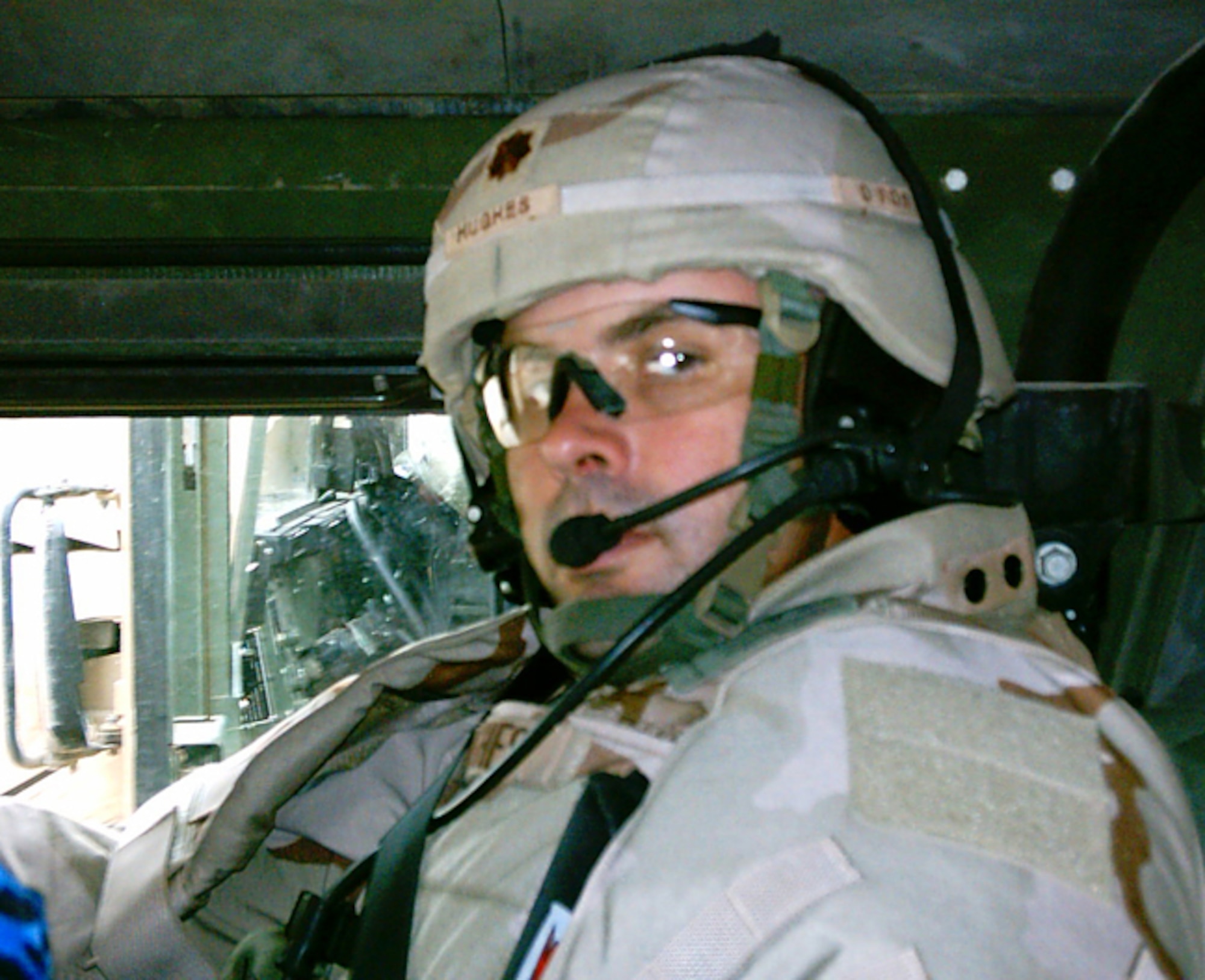 MOODY AIR FORCE BASE, Ga. -- Maj. Freddrick Hughes, Jr., 347th Logistics Readiness Squadron, prepares for one of the more than 80 convoys he helped conduct during his eight-month deployment to Iraq. Major Hughes'  dedication earned him the Bronze Star. (Courtesy Photo)
