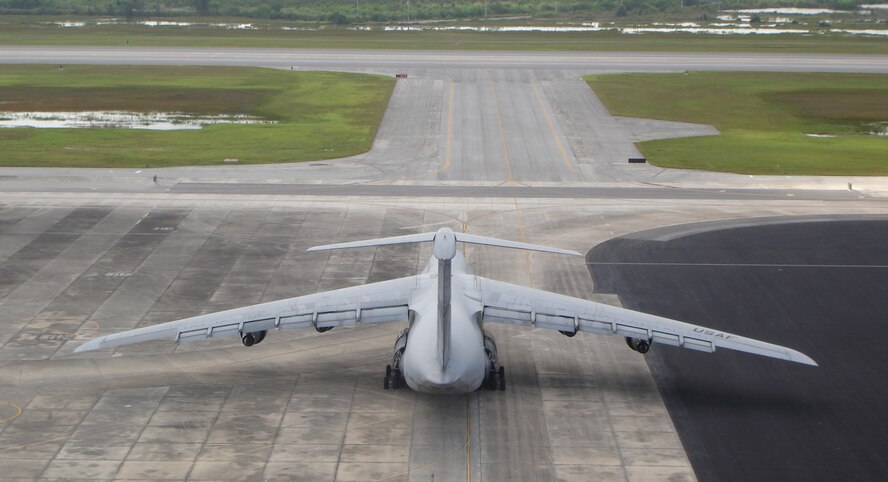 A C-5A "Galaxy" from the 68th Airlift Squadron, San Antonio, Texas taxis to the runway here at Homestead Air Reserve Base, Fla. Aug. 13. The C-5 crew flew dozens of 482nd Fighter Wing reservists and equipment in support of exercise Cactus Aloha at Hickam AFB, Hawaii. (US Air Force photo by Lt. Col. Thomas Davis)
