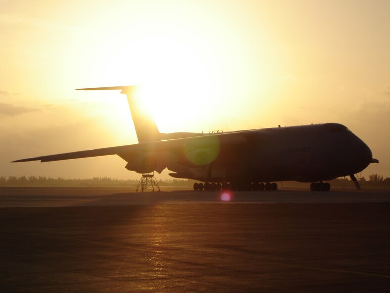 A C-5A "Galaxy" from the 68th Airlift Squadron, San Antonio, Texas waits for its passengers here at Homestead Air Reserve Base, Fla. Aug. 13. The C-5 crew flew dozens of 482nd Fighter Wing reservists and equipment in support of exercise Cactus Aloha at Hickam AFB, Hawaii. (US Air Force photo by Lt. Col. Thomas Davis)