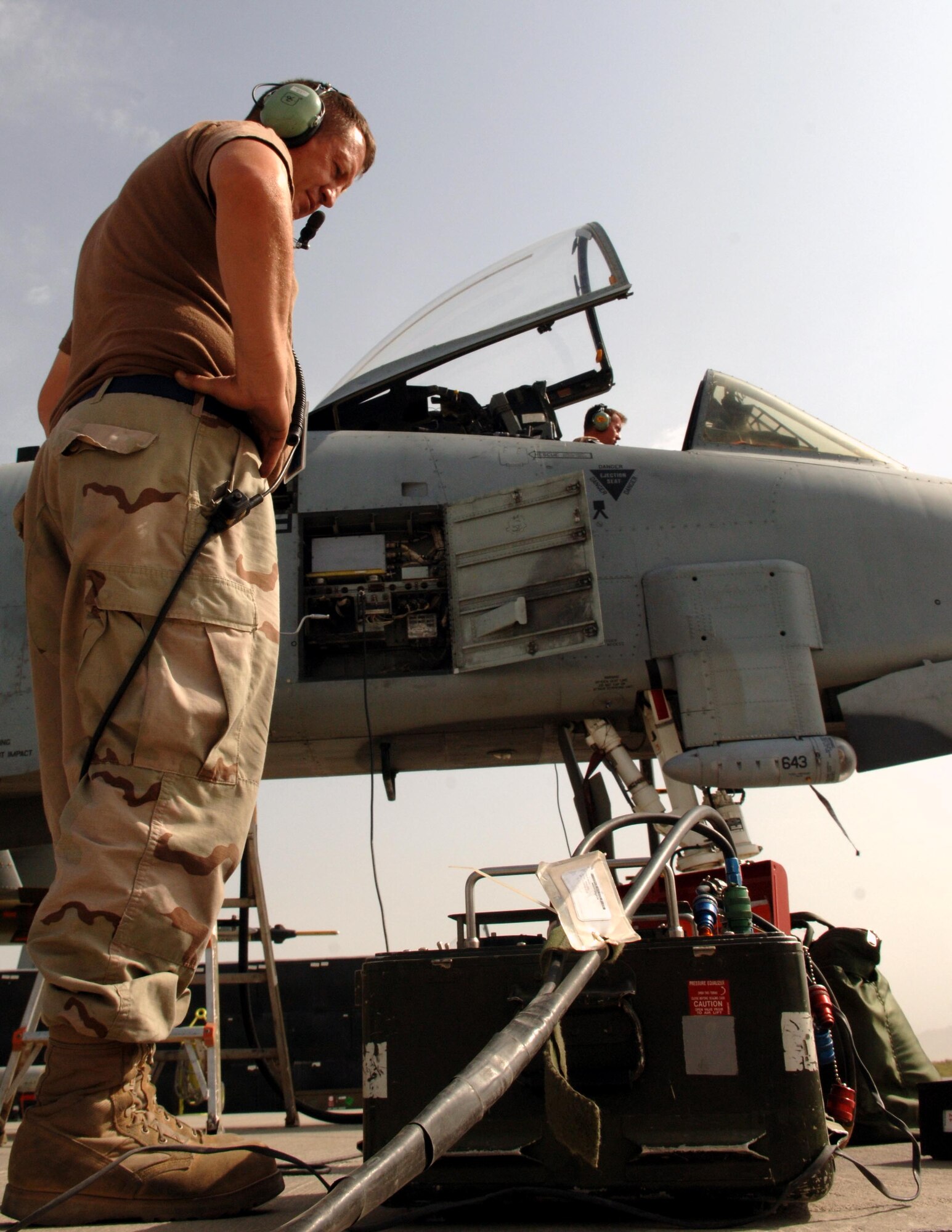 Tech. Sgt. Carl Clark (left) and Master Sgt. Dan Abrams perform an altimeter check on an A-10 Thunderbolt II at Bagram Air Base, Afghanistan, on Aug. 17. They are deployed from the Air Force Reserve Command's 442nd Fighter Wing at Whiteman Air Force Base, Mo. (U.S. Air Force photo/Master Sgt. Orville F. Desjarlais Jr.)