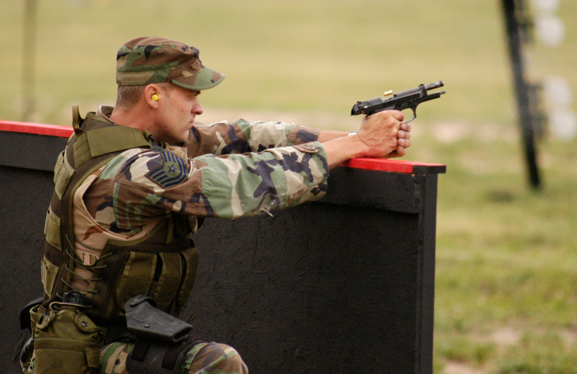 Tech. Sgt. Brian Johnson fires at targets during the Guardian Challenge marksmanship competition at the U.S. Air Force Academy, Colo., on Aug. 15. Sergeant Johnson is the 50th Security Forces Squadron team leader at Schriever Air Force Base, Colo. (U.S. Air Force photo/Senior Airman Jason Ridder)