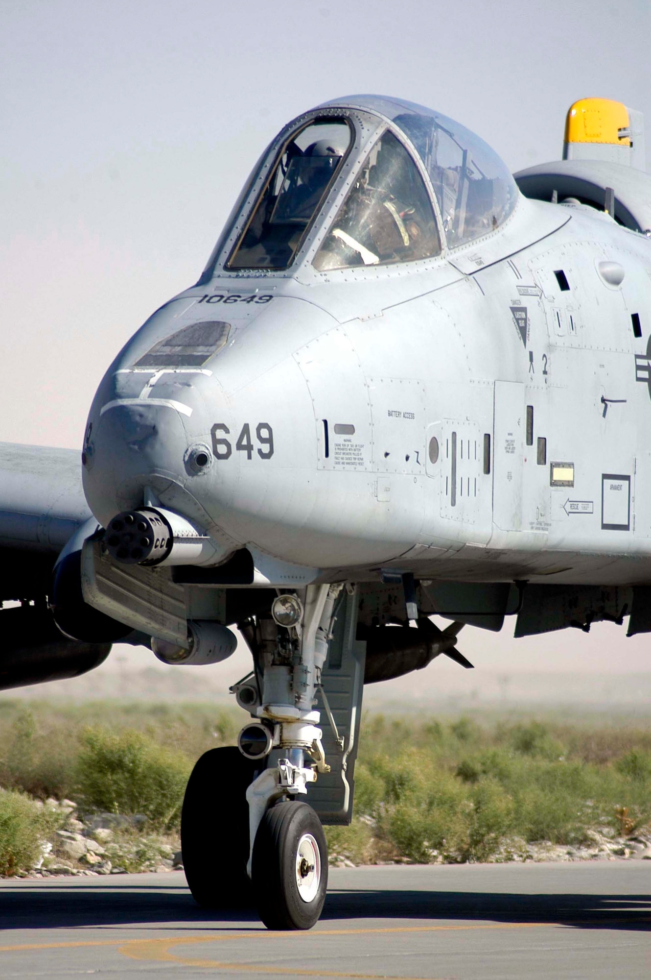 An A-10 Thunderbolt II from the 81st Expeditionary Fighter Squadron taxis to a de-arm area at Bagram Air Base, Afghanistan, following a combat sortie. The A-10's 30-mm gun, a signature capability of the aircraft, delivers enormous firepower to support ground forces engaged against anti-coalition extremists. (U.S. Air Force photo/Maj. David Kurle) 
