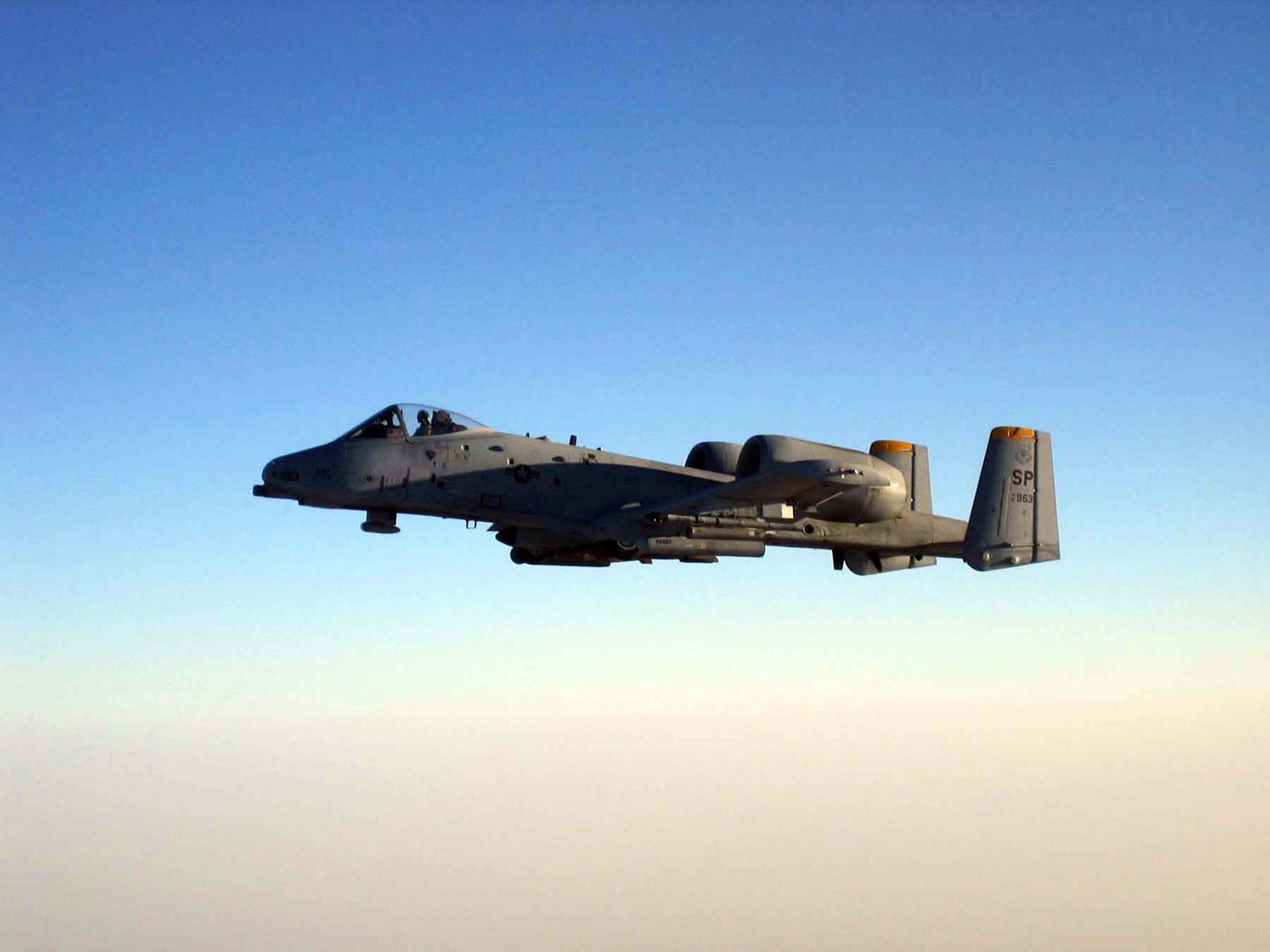 An A-10 deployed to the 455th Air Expeditionary Wing at Bagram Airfield, Afghanistan, from Spangdahlem Air Base, Germany, flies a combat sortie over Afghanistan in support of Operation Enduring Freedom. A-10s are deployed to Bagram from Spangdahlem and Whiteman Air Force Base, Mo., and are flying close-air-support missions for U.S. and coalition forces on the ground. (U.S. Air Force photo/1st Lt. Jeffrey Ballenski) 
