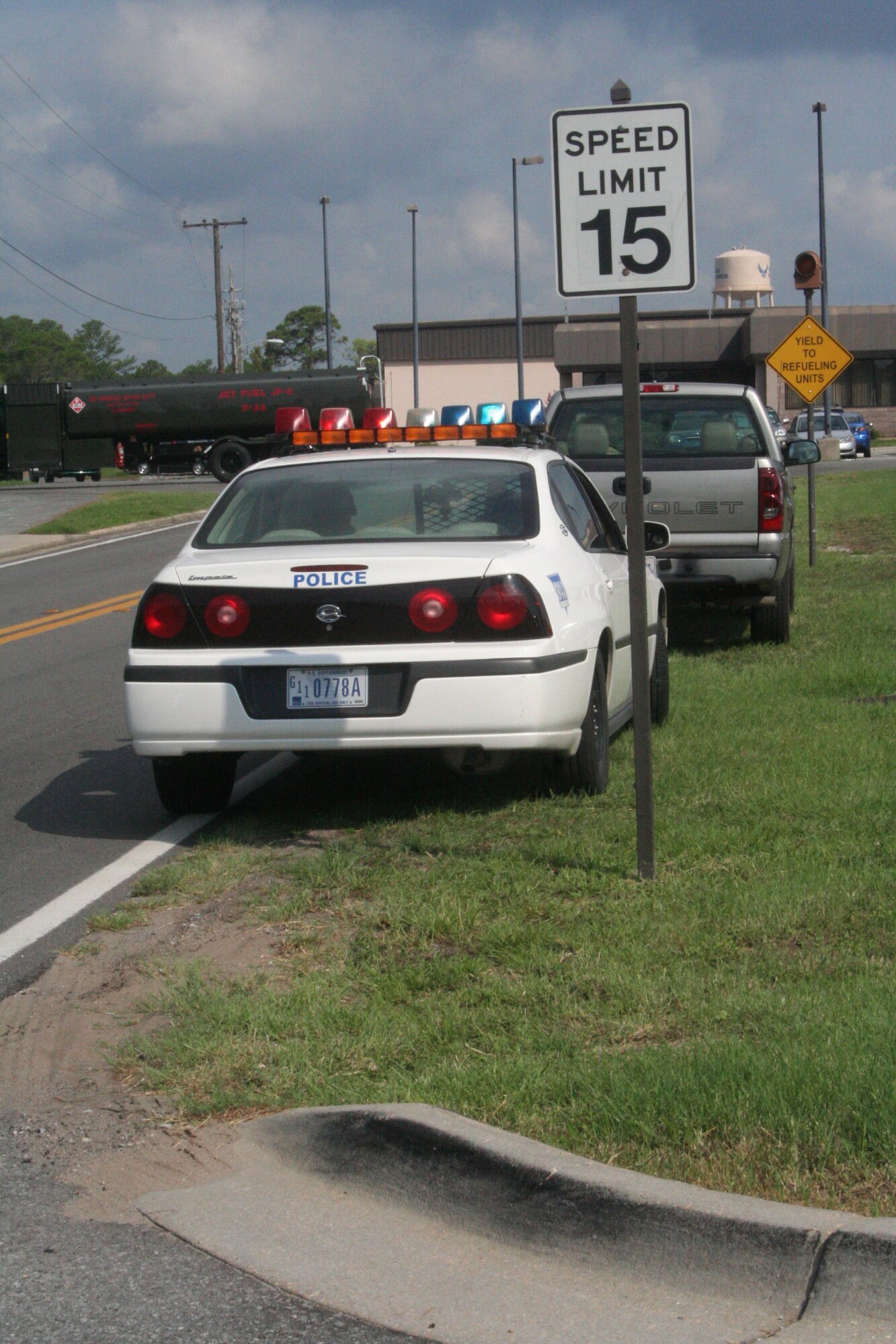 The speed limit on Tully Street drops to 15 mph near the aircraft refueler crossing. Drivers must yield to refueling vehicles entering the flightline. They must reach the aircraft in a safe and timely manner to ensure mission capability. Motorists should prepare to stop when the yellow lights are flashing, indicating a refueling vehicle is about to cross. The 16th Security Forces is monitoring the area for speeding violations. Security forces Airmen have ticketed more than six vehicles in a one-hour time frame in the area. (U.S. Air Force Photograph by Staff Sgt. Mareshah Haynes)