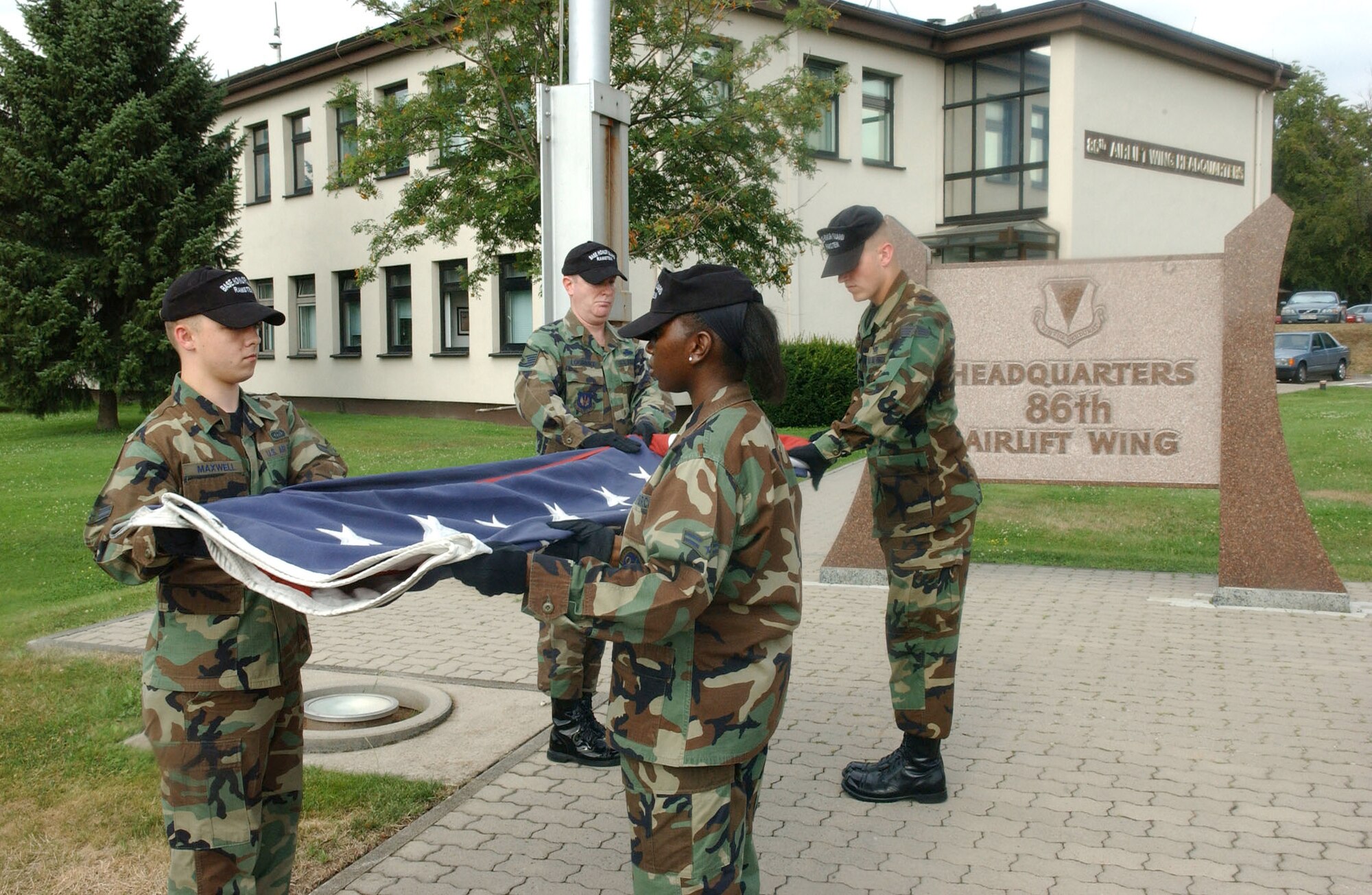 Airmen from Ramstein’s Honor Guard perform a retreat ceremony in front of the 86th Airlift Wing Headquarters building. The 86th Air and Space Communications Squadron will hold the next retreat at 4:30 p.m. Aug. 31 at Ramp 3, just across from the wing flagpoles.