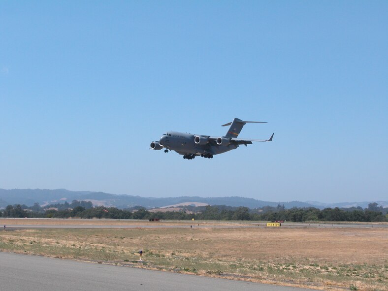 A C-17 Globemaster III assigned to the 729th Airlift Squadron at March ARB preapares to land at Sonoma County Airport in Santa Rosa, California, in preparation for the county's annual Wings Over Wine Country airshow held August 19 and 20. (U.S. Air Force Photo by Staff Sgt. Joe Davidson) 
